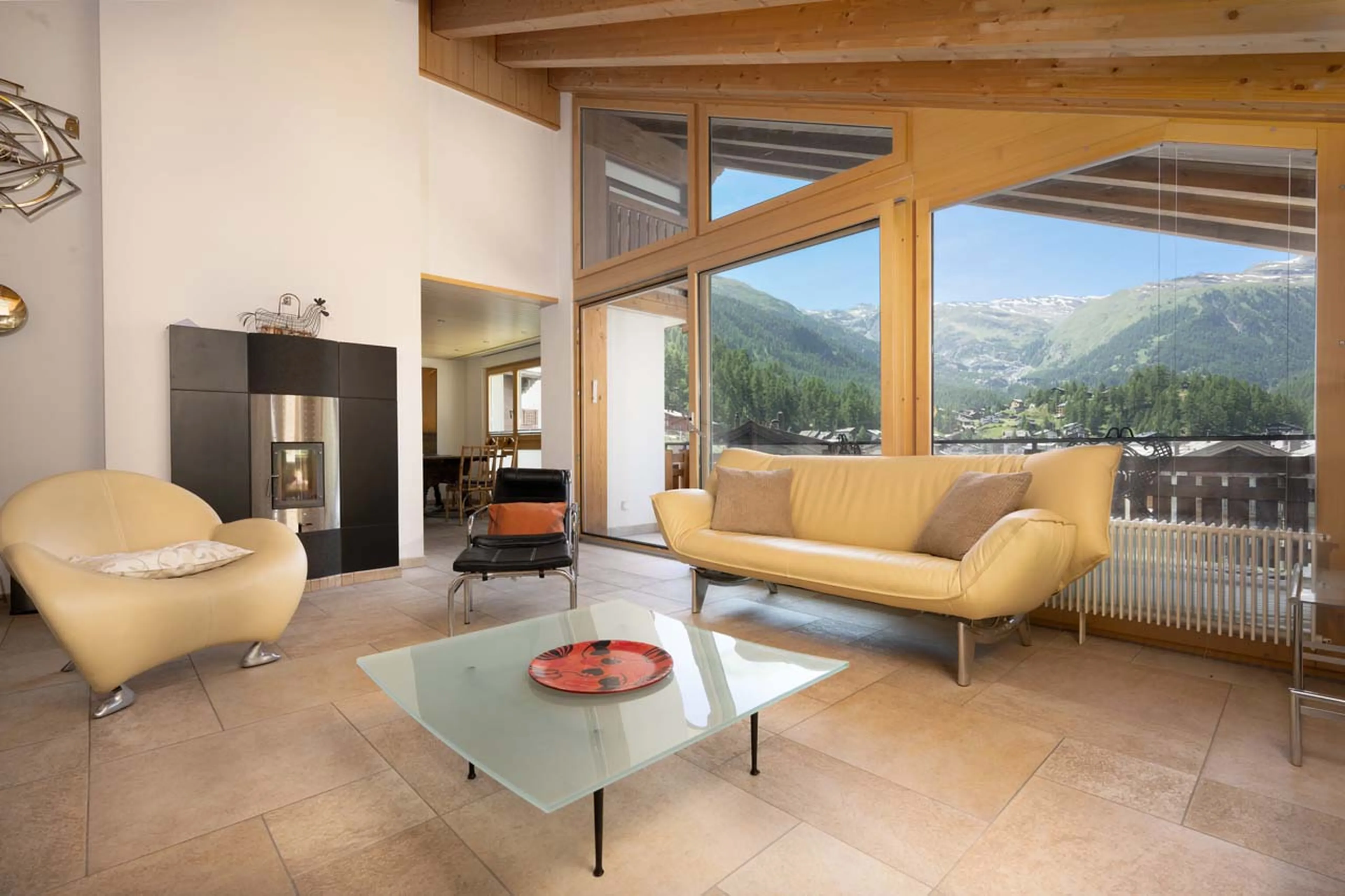 Fireplace in living area of Penthouse Tiara in Zermatt