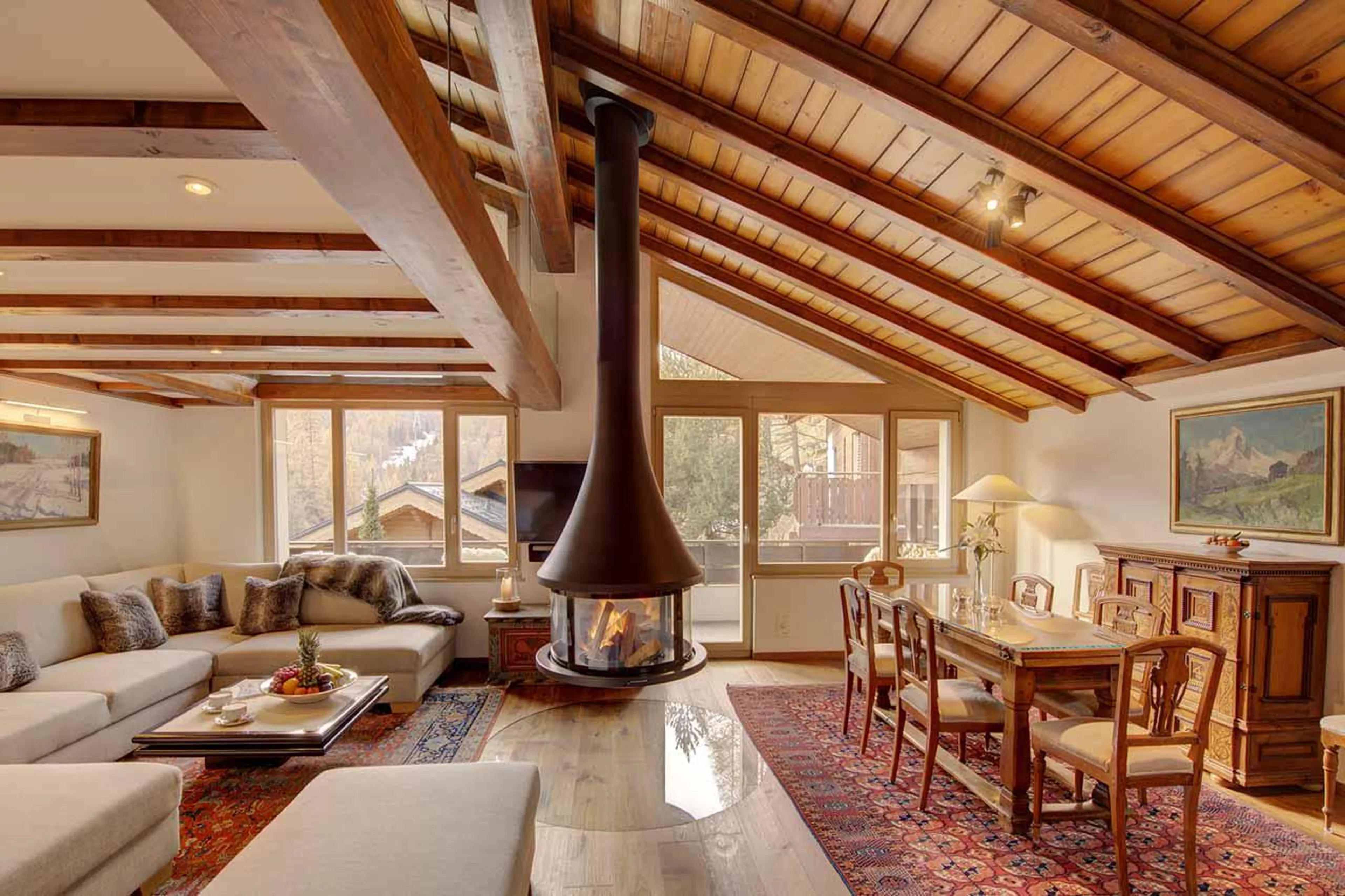 Bright and spacious open-plan living area at Penthouse Zen in Zermatt