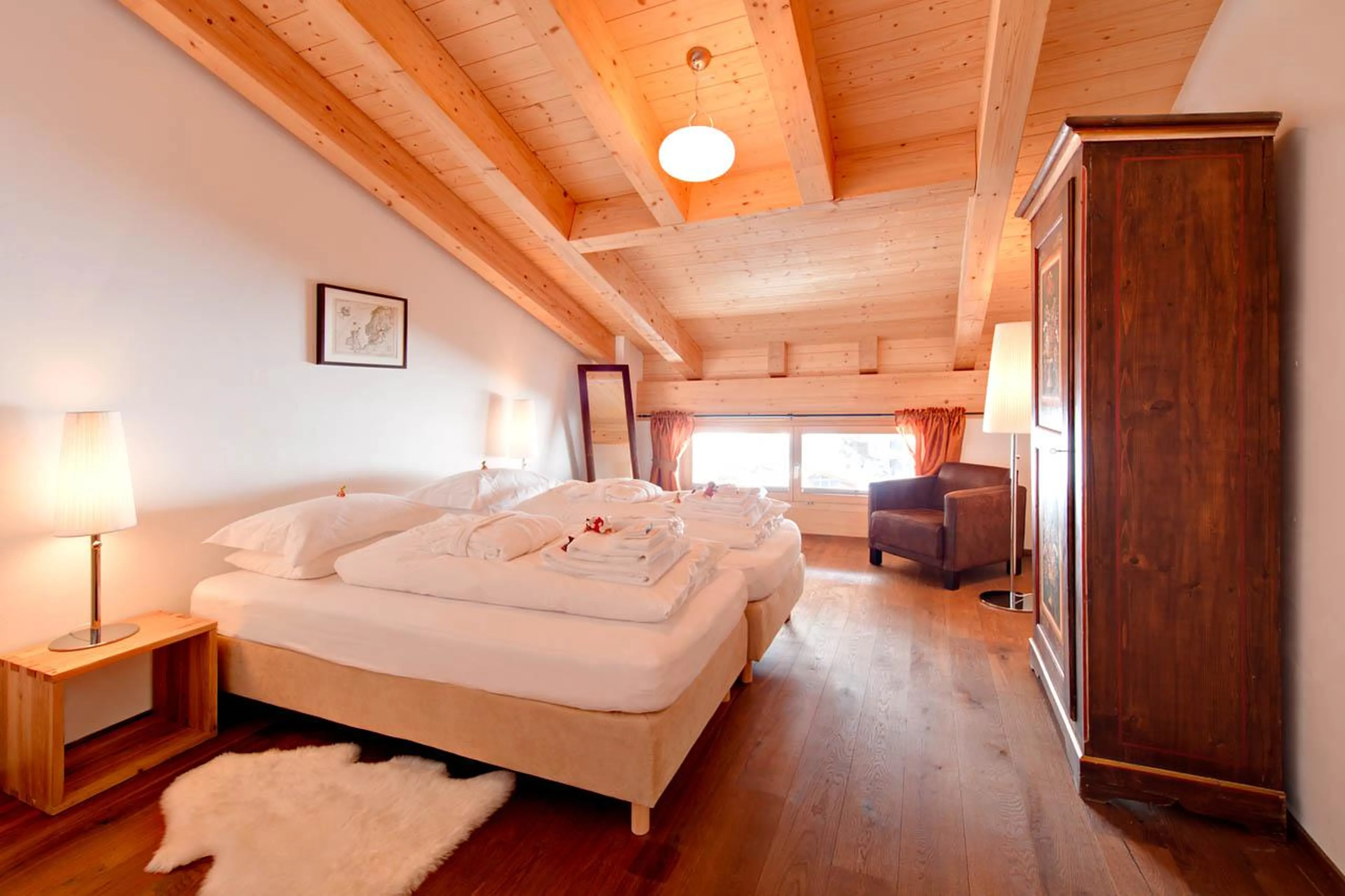 Bedroom one at Chalet Zeus in Zermatt