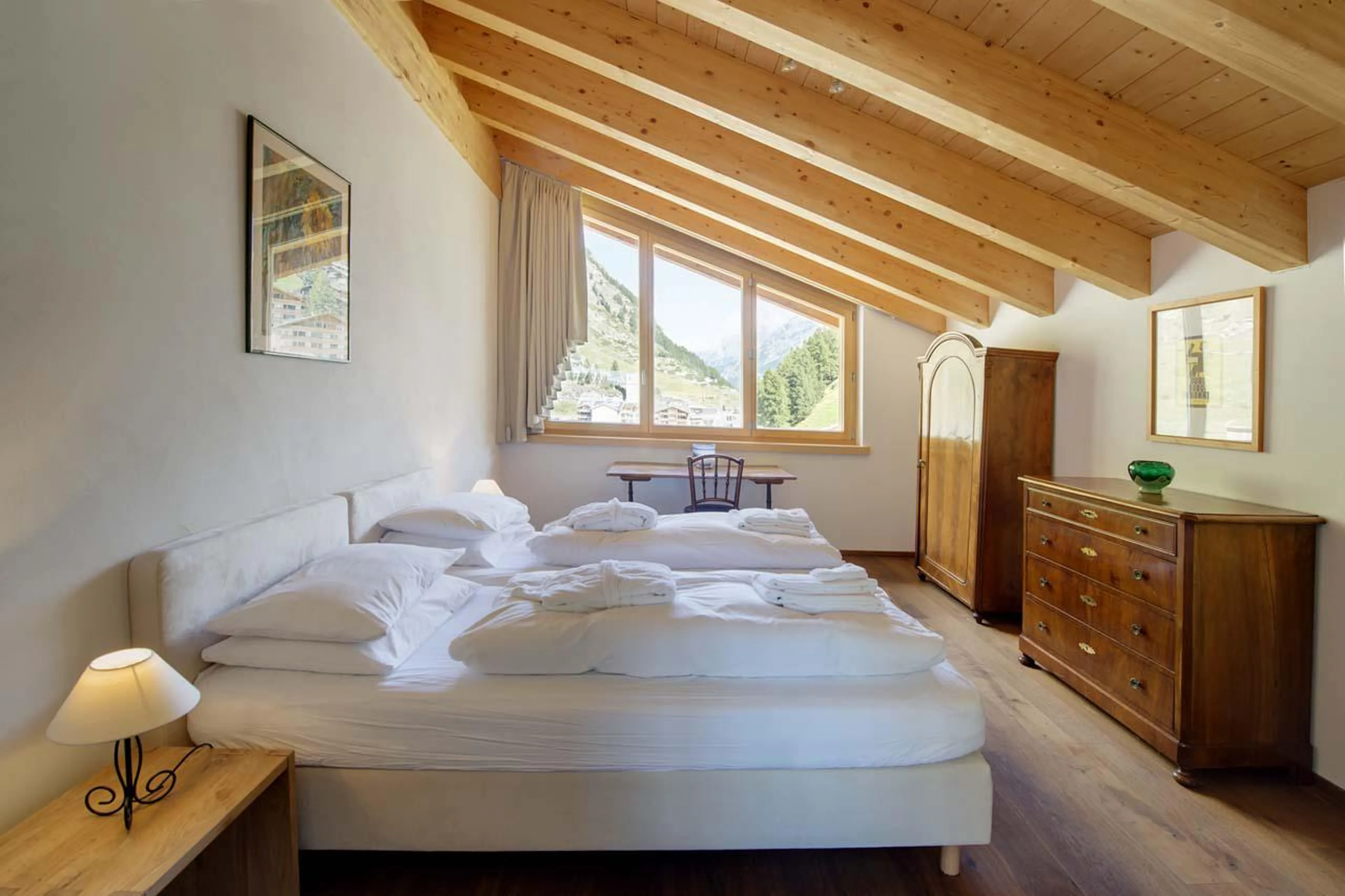 Bedroom two at Chalet Zora in Zermatt in summer