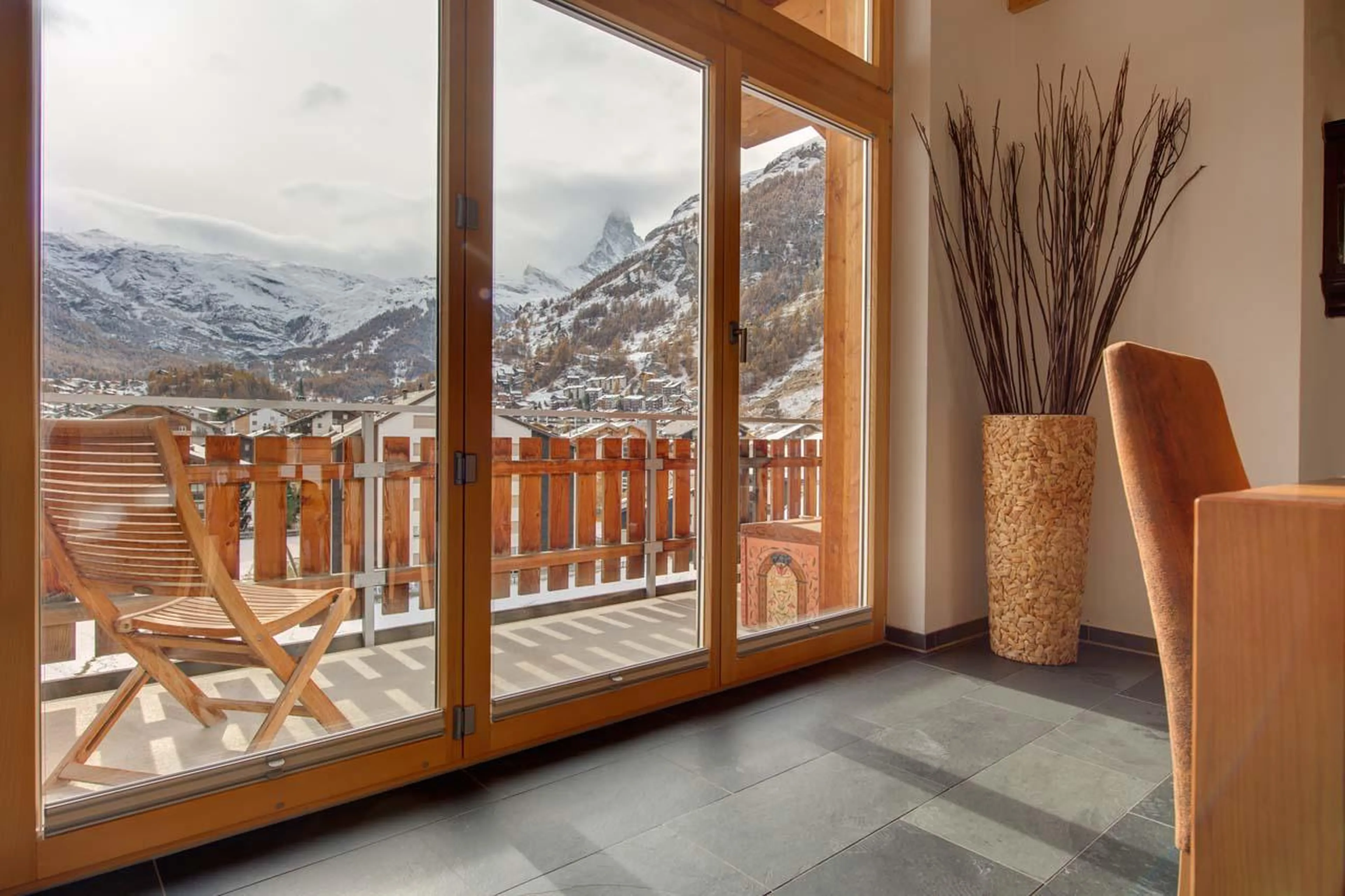 Access to south-facing balcony at Penthouse Zora in Zermatt