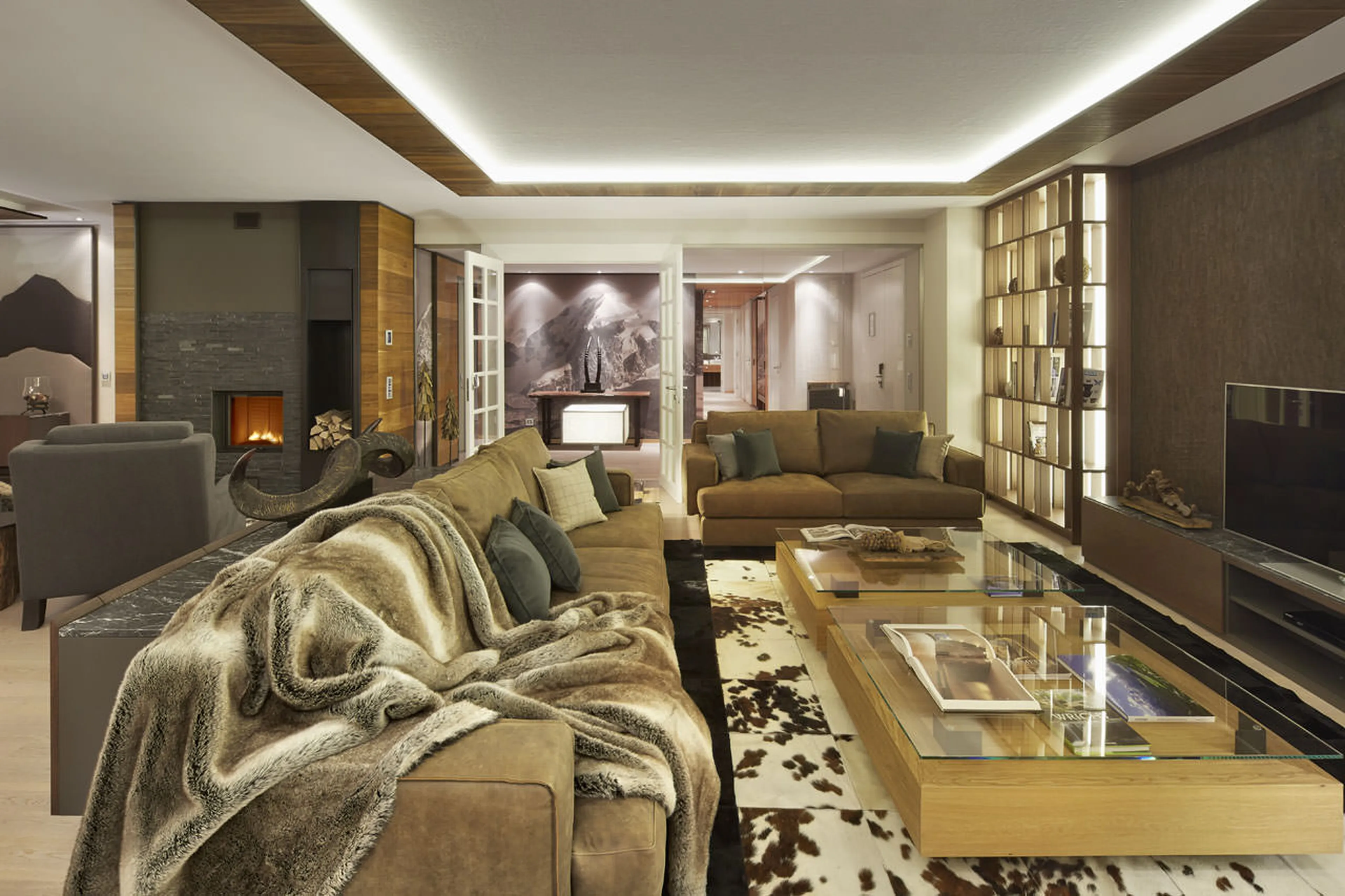 TV and fireplace in living area of Piz Vadret in St. Moritz