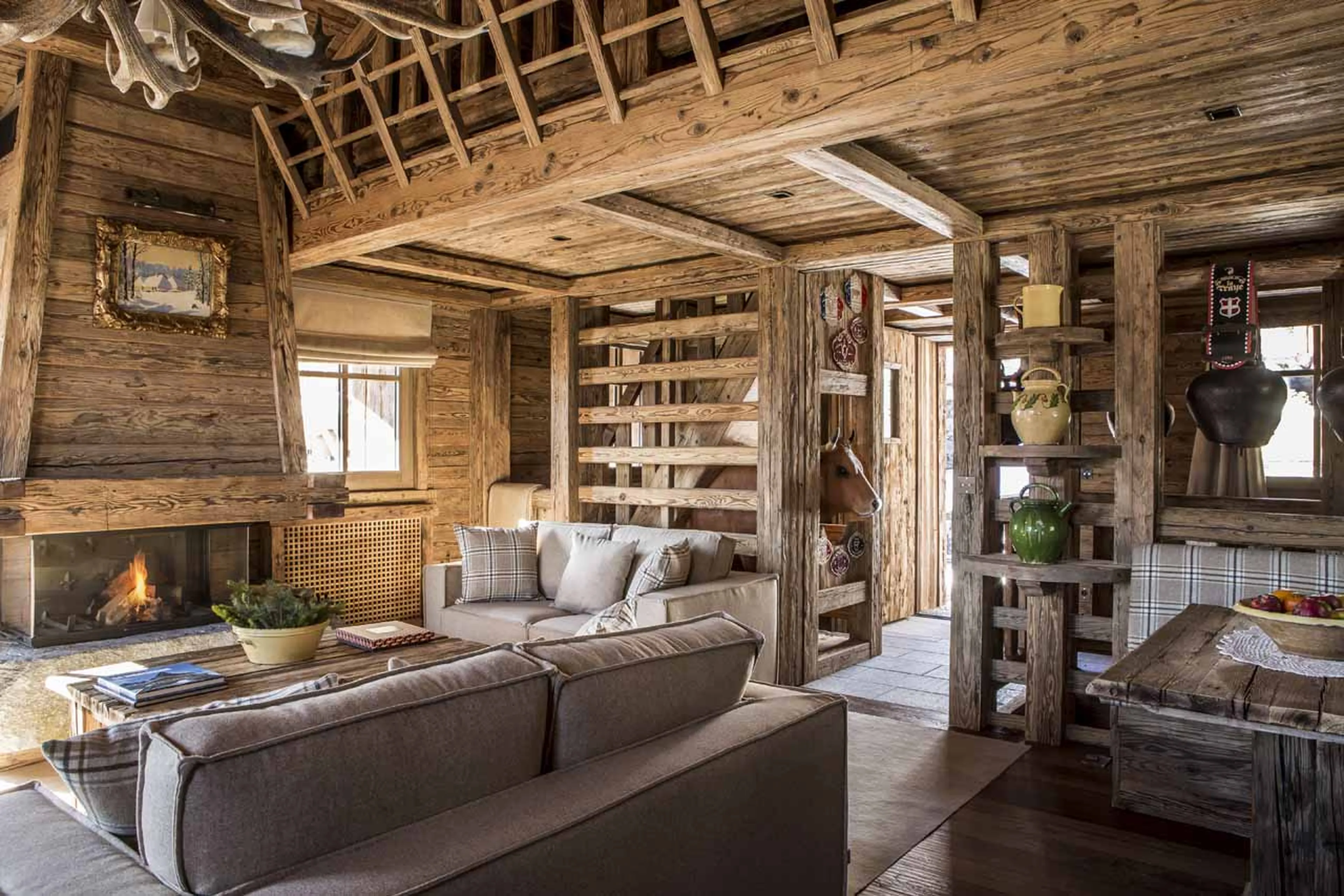 Living area with fireplace at Refuge de la Traye in Meribel