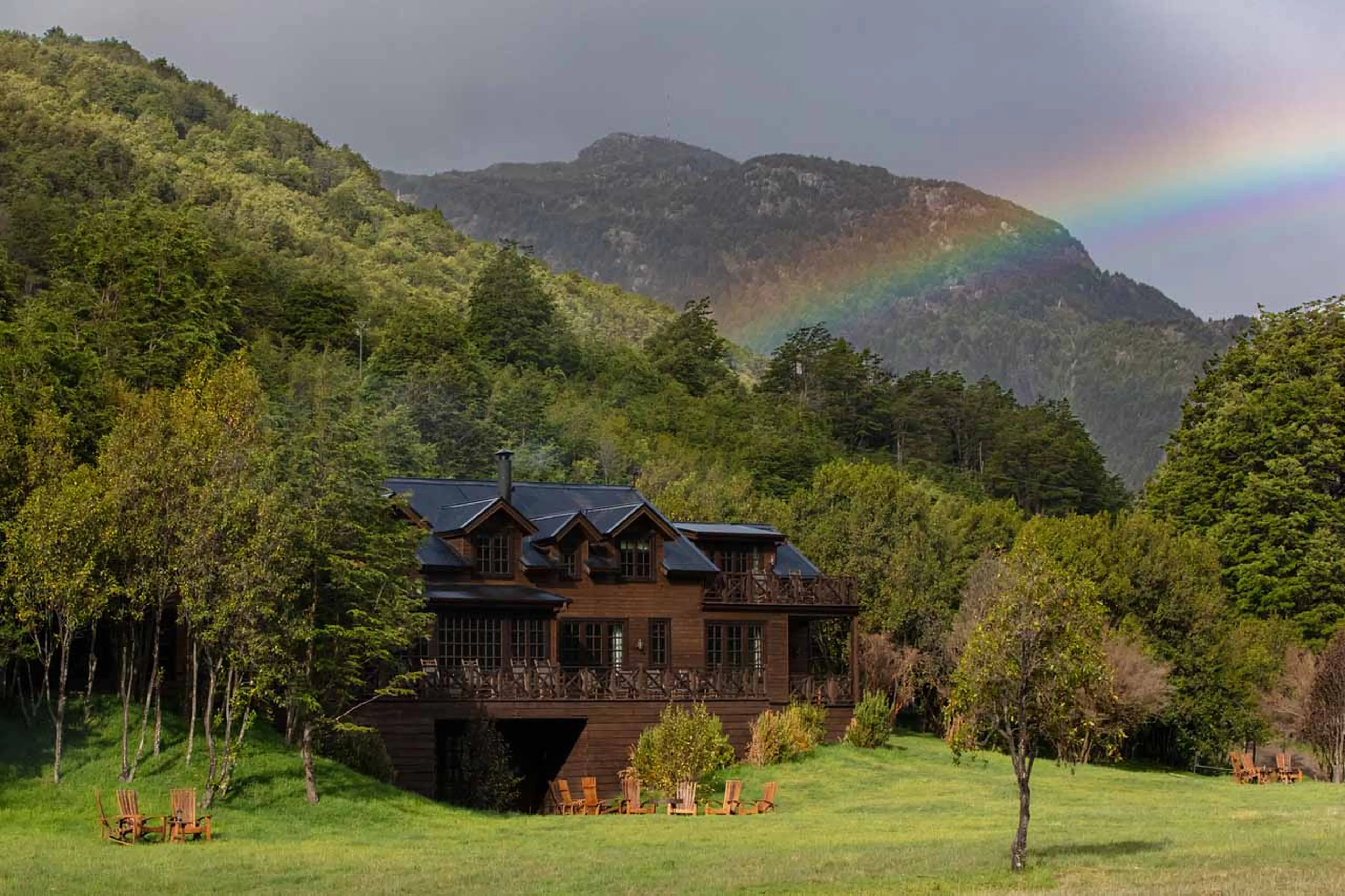 Exterior and rainbow over Rio Palena Lodge in Patagonia
