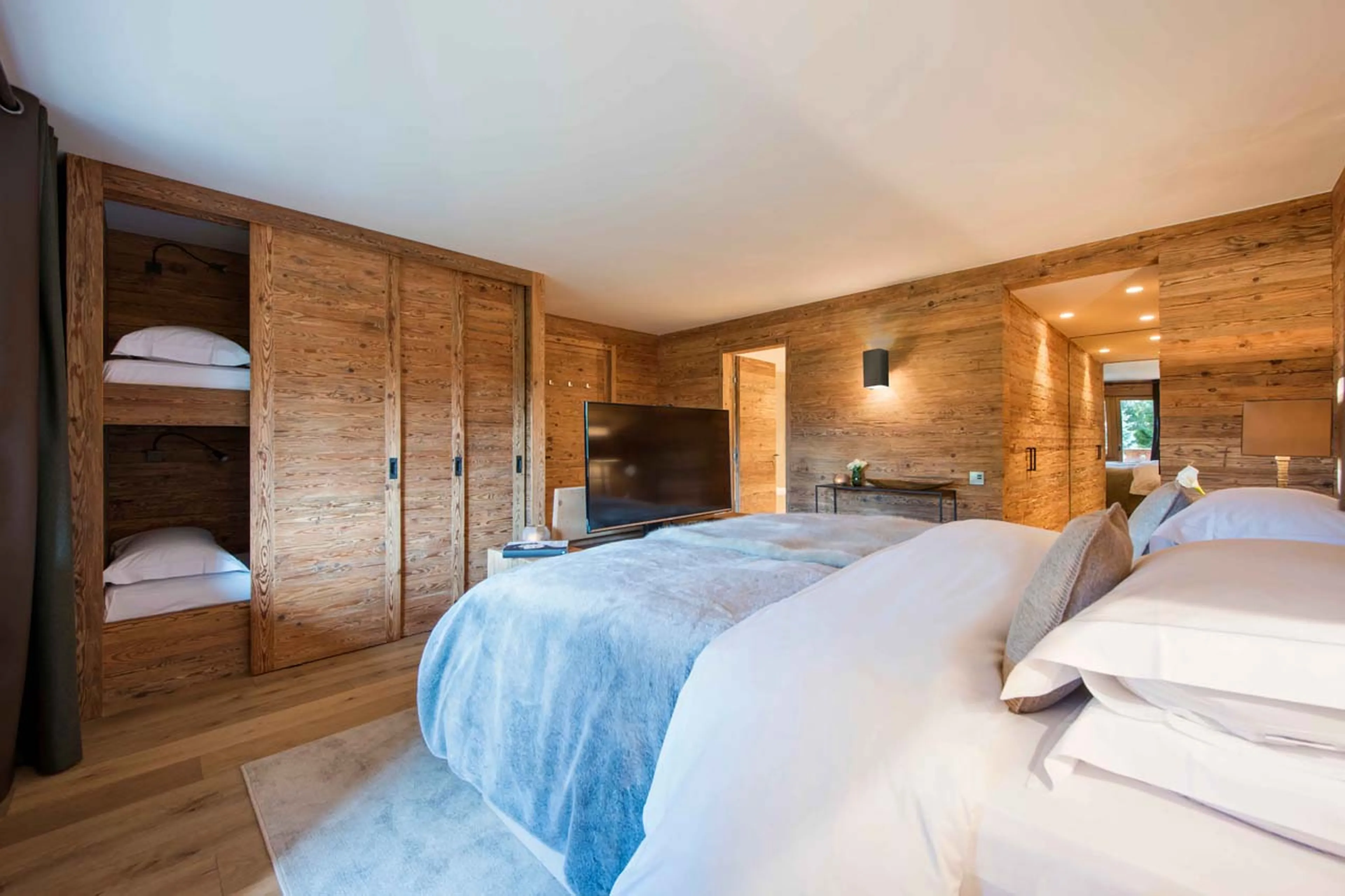 TV in bedroom one at Exterior of Apartment Rosalp 4 in Verbier