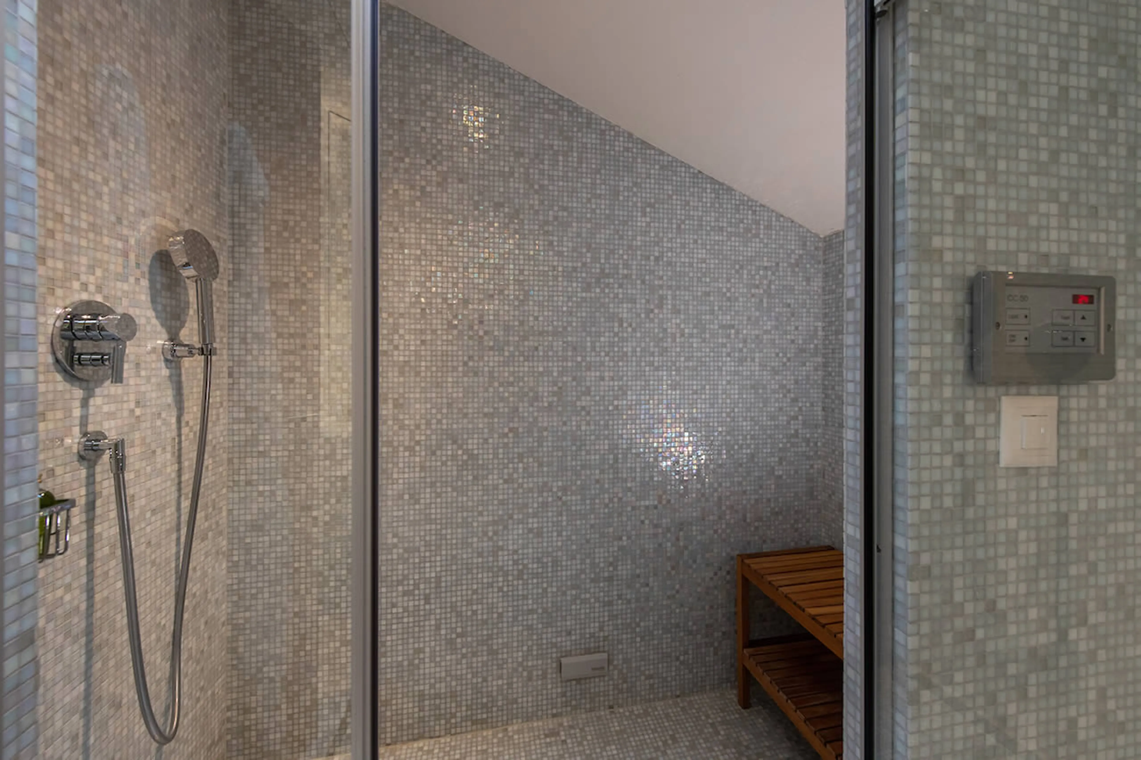 En suite shower room in Royalp Modern Penthouse in Villars