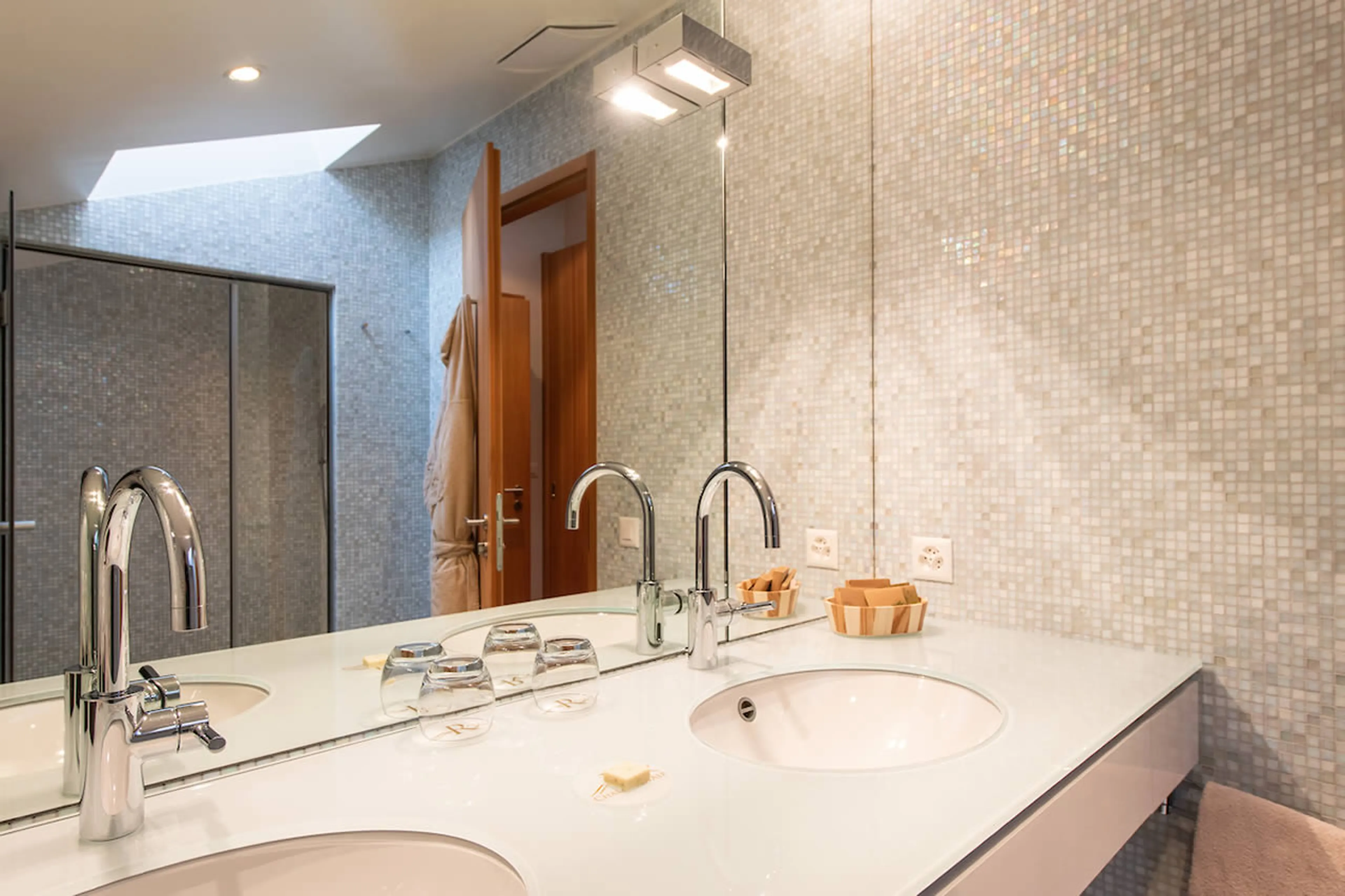 Double basin in en-suite shower room in Royalp Modern Penthouse in Villars