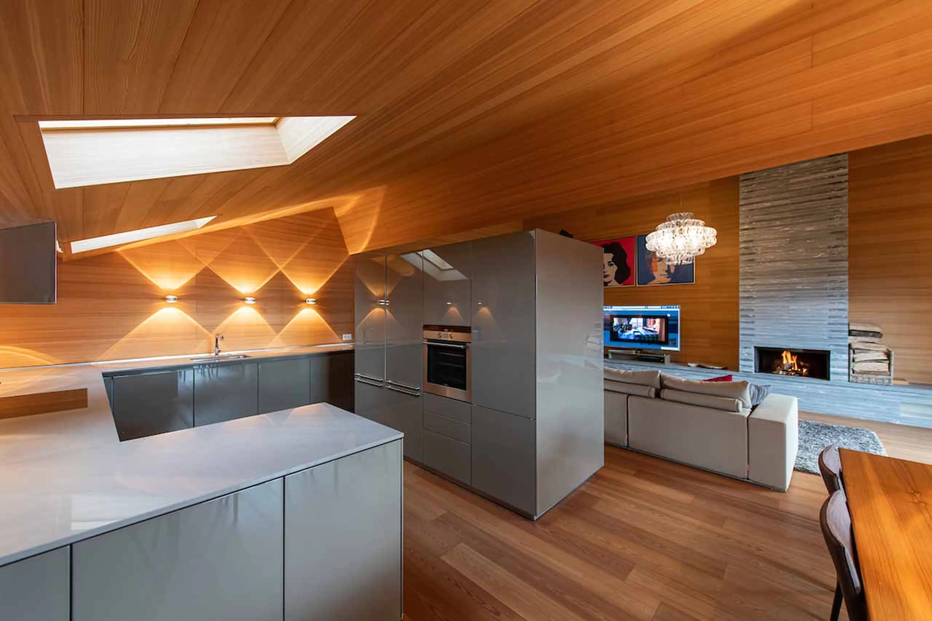 Kitchen and dining area at Royalp Modern Penthouse in Villars