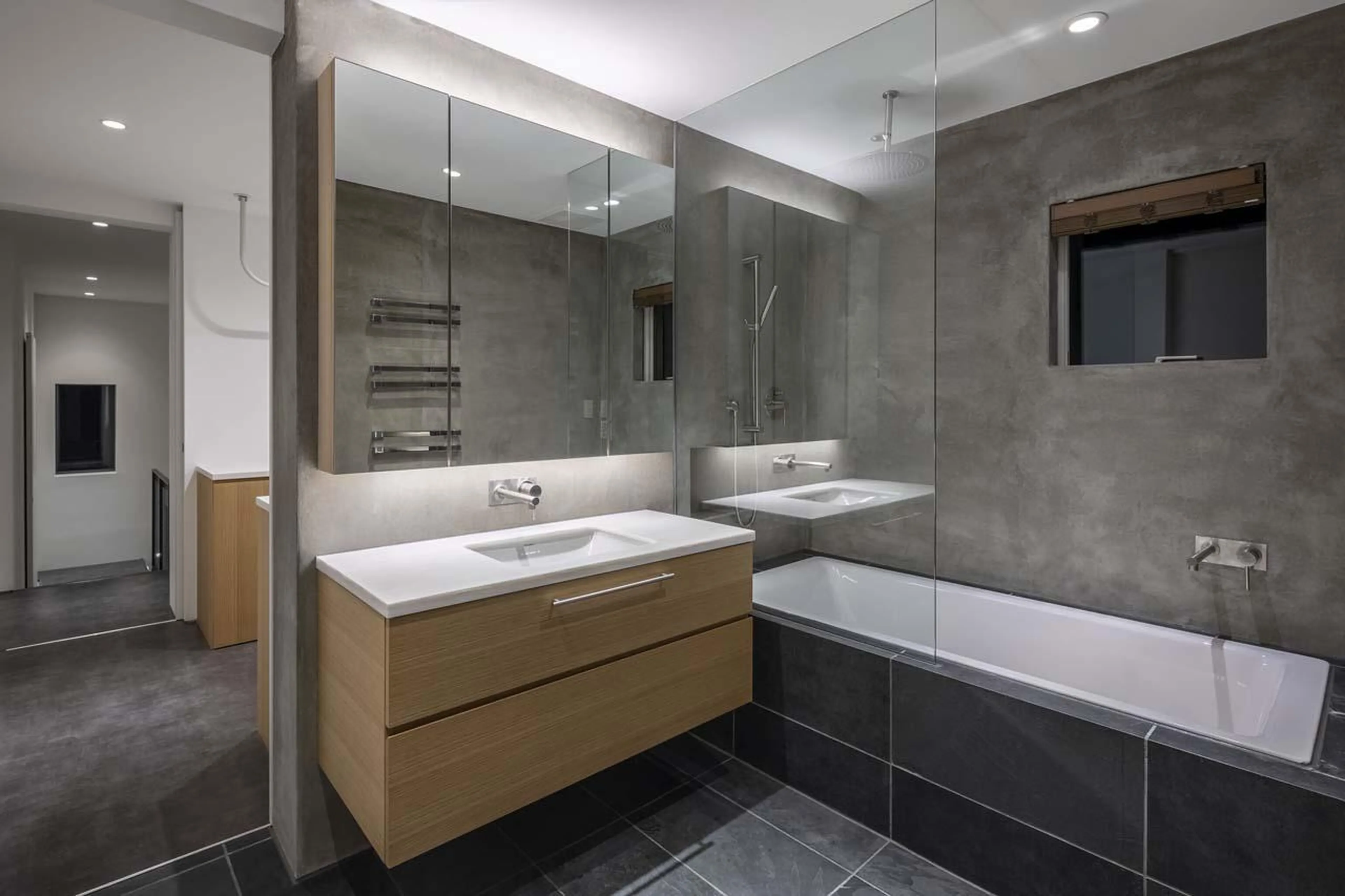 En-suite bathroom with shower over the bath at Silver Dream in Niseko