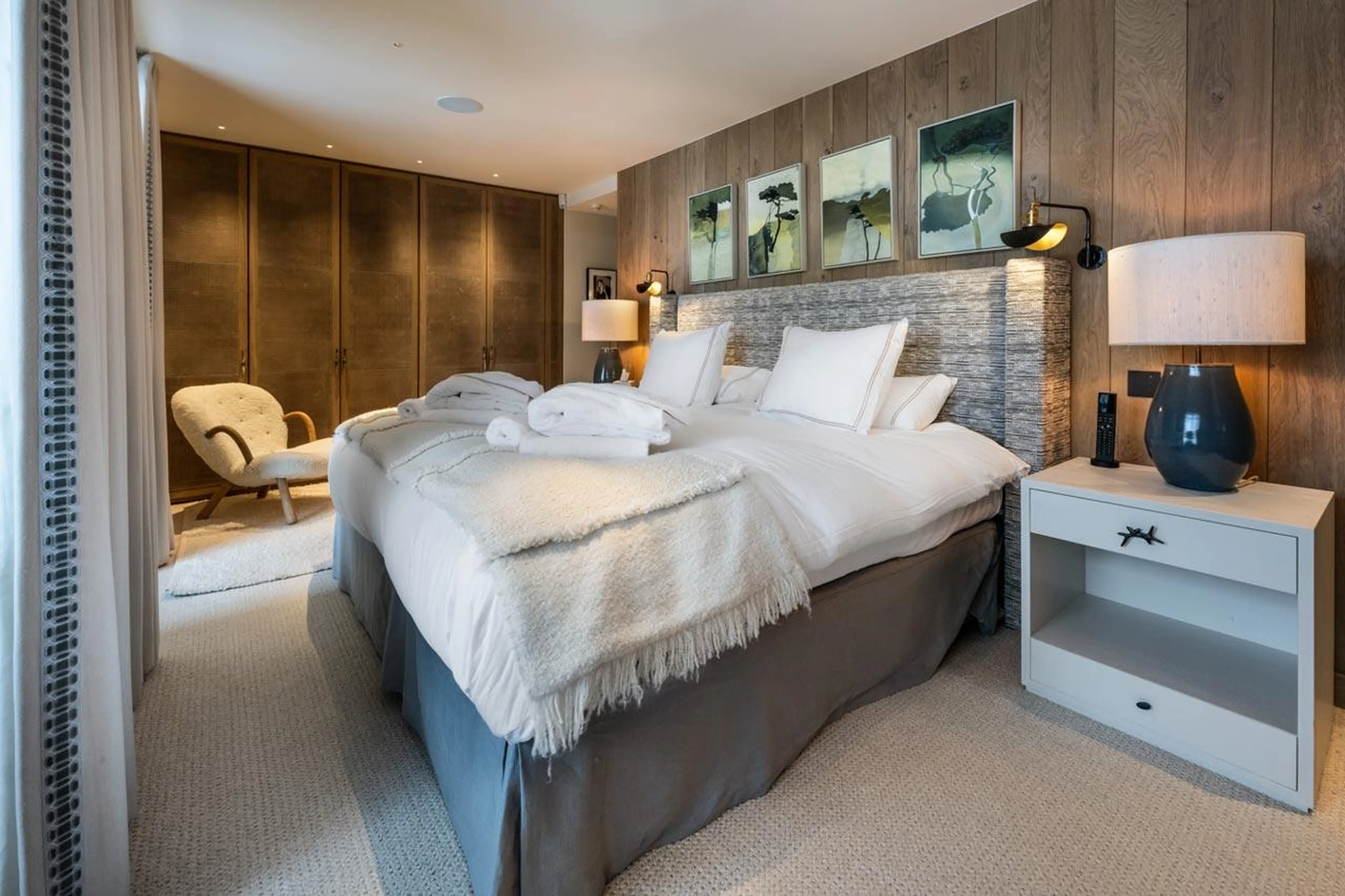 Double bedroom with king-size bed at Silverstone Lodge Penthouse 4 in Val d'Isere