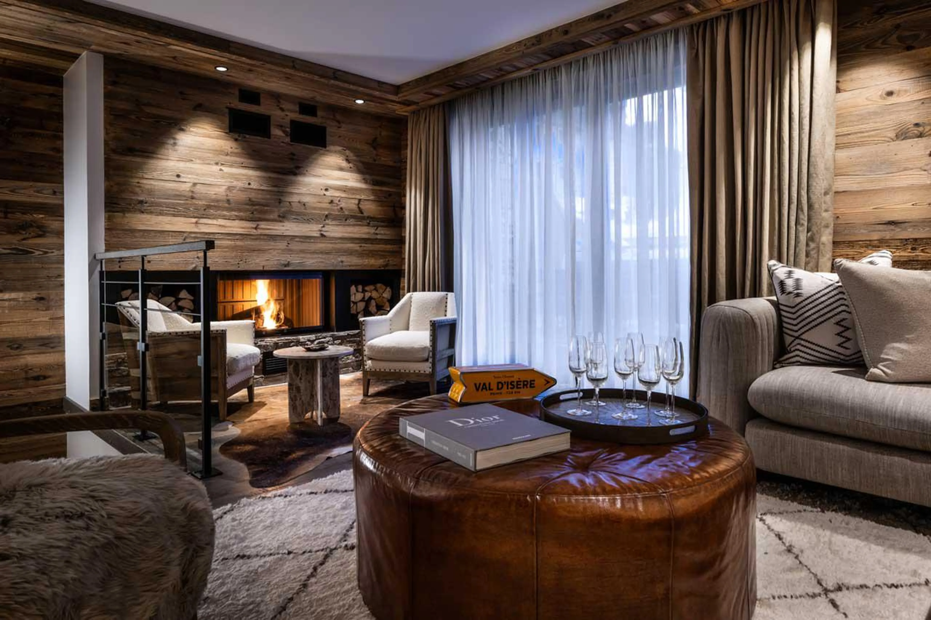 Wood-burning fireplace at Silverstone Lodge 6 in Val d'Isere