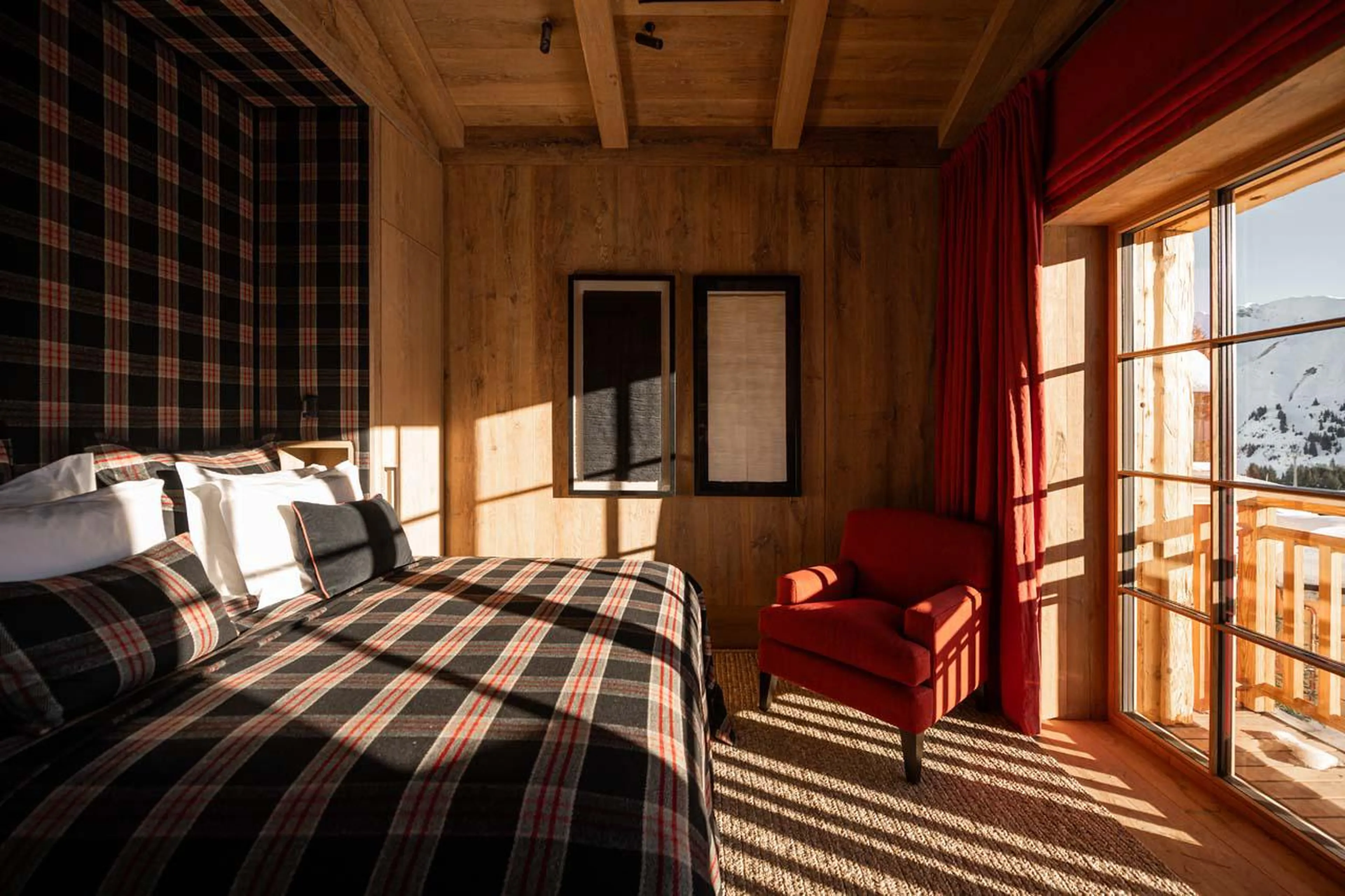 Double bedroom with private balcony and en-suite shower room at The Barn in Lech