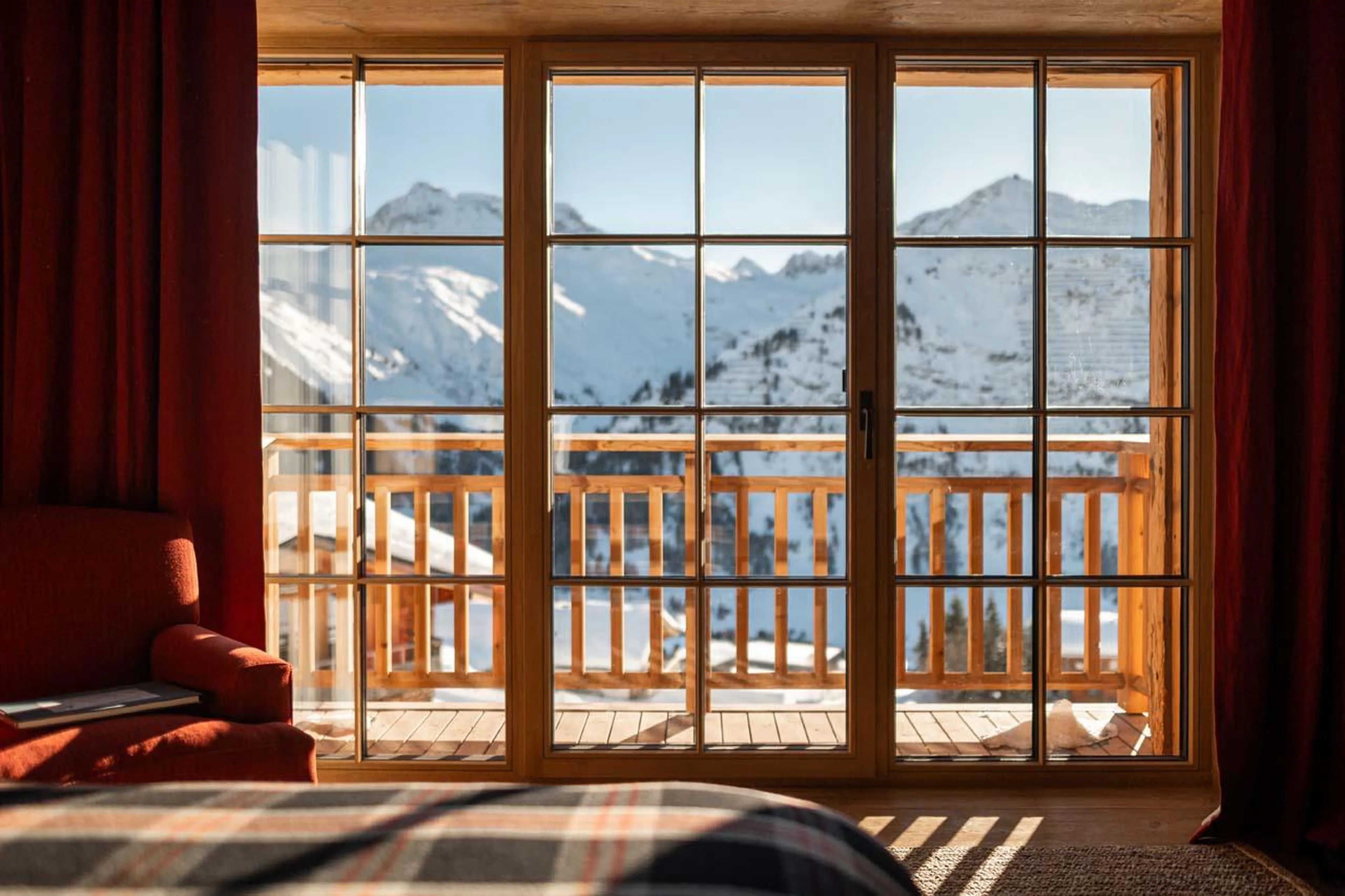 Private balcony with stunning views over the mountain peaks at The Barn in Lech