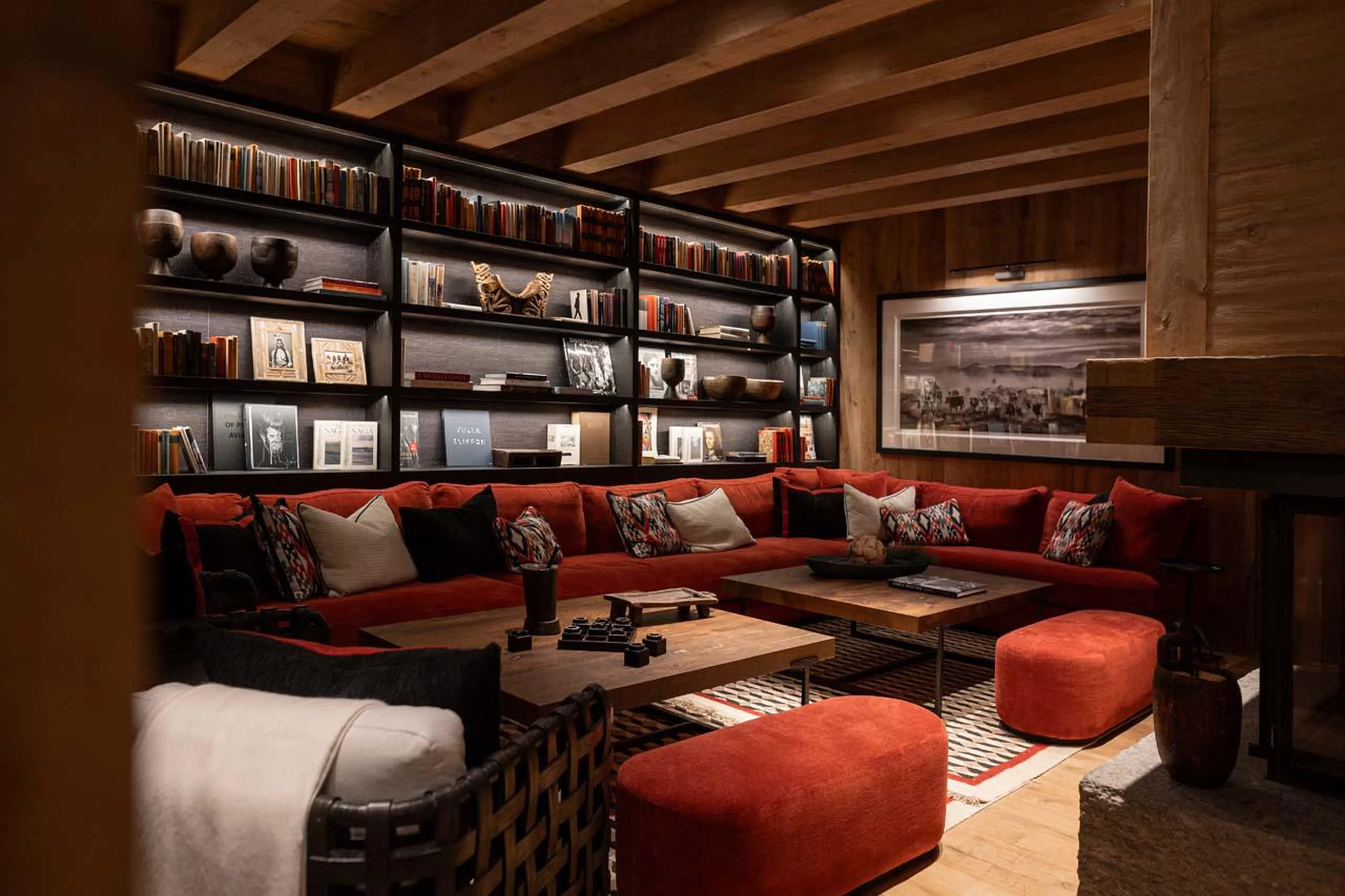 Comfortable seating area next to the fireplace at The Barn in Lech