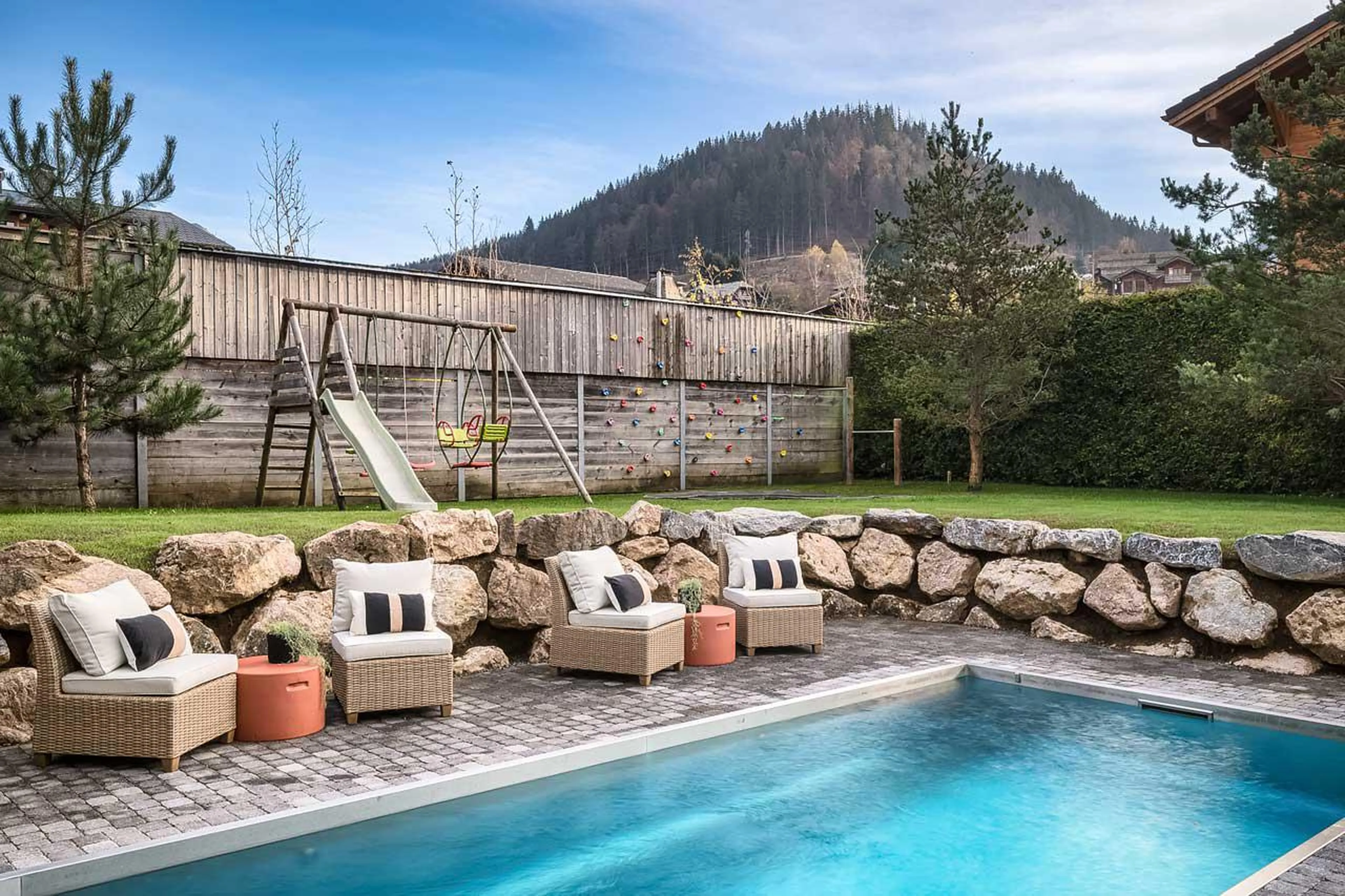 Outdoor pool and garden at The Bungo in Morzine