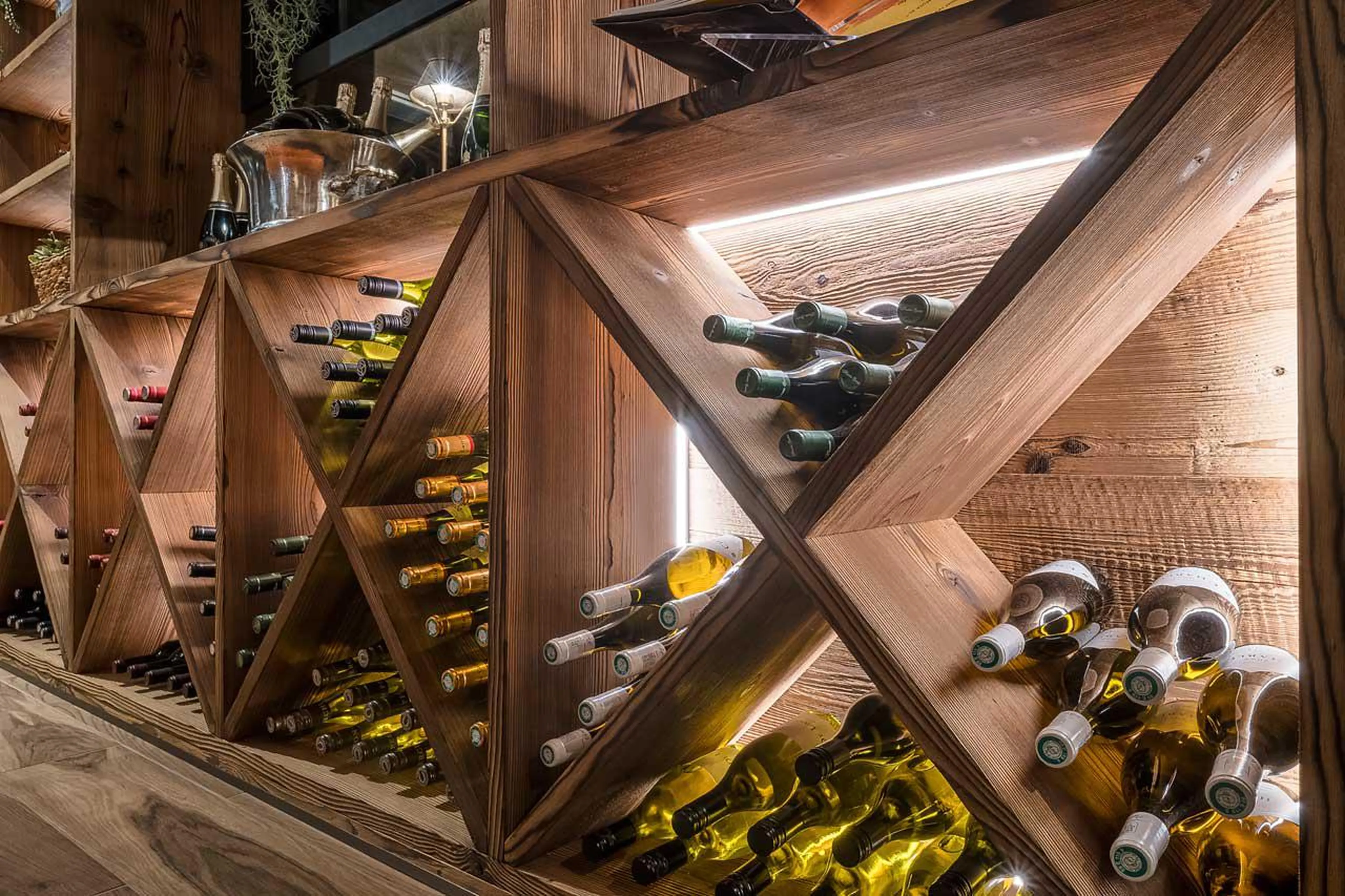 Feature wall wine rack at The Bungo in Morzine