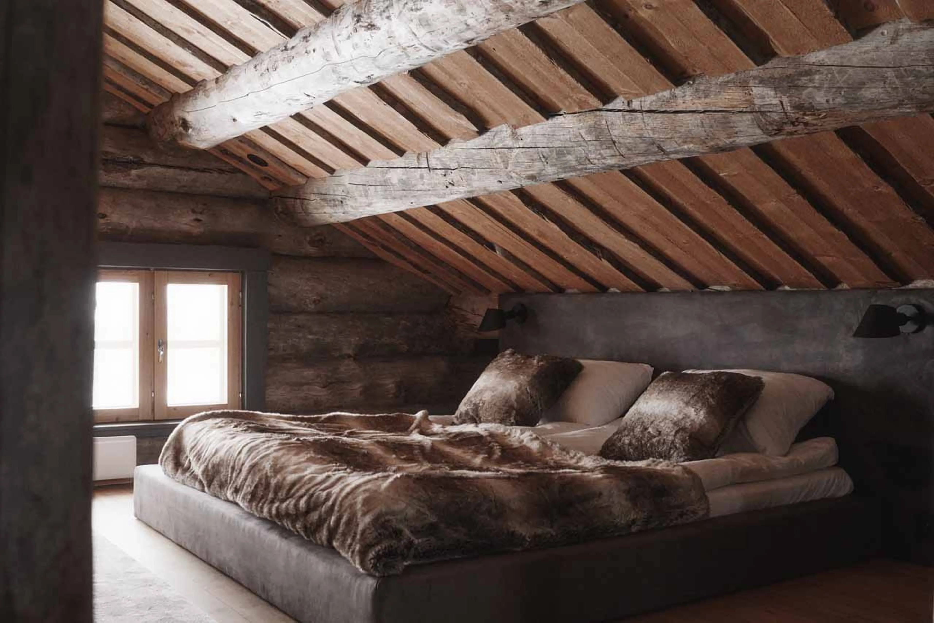 Double bed in The Fell Lodge, Finland