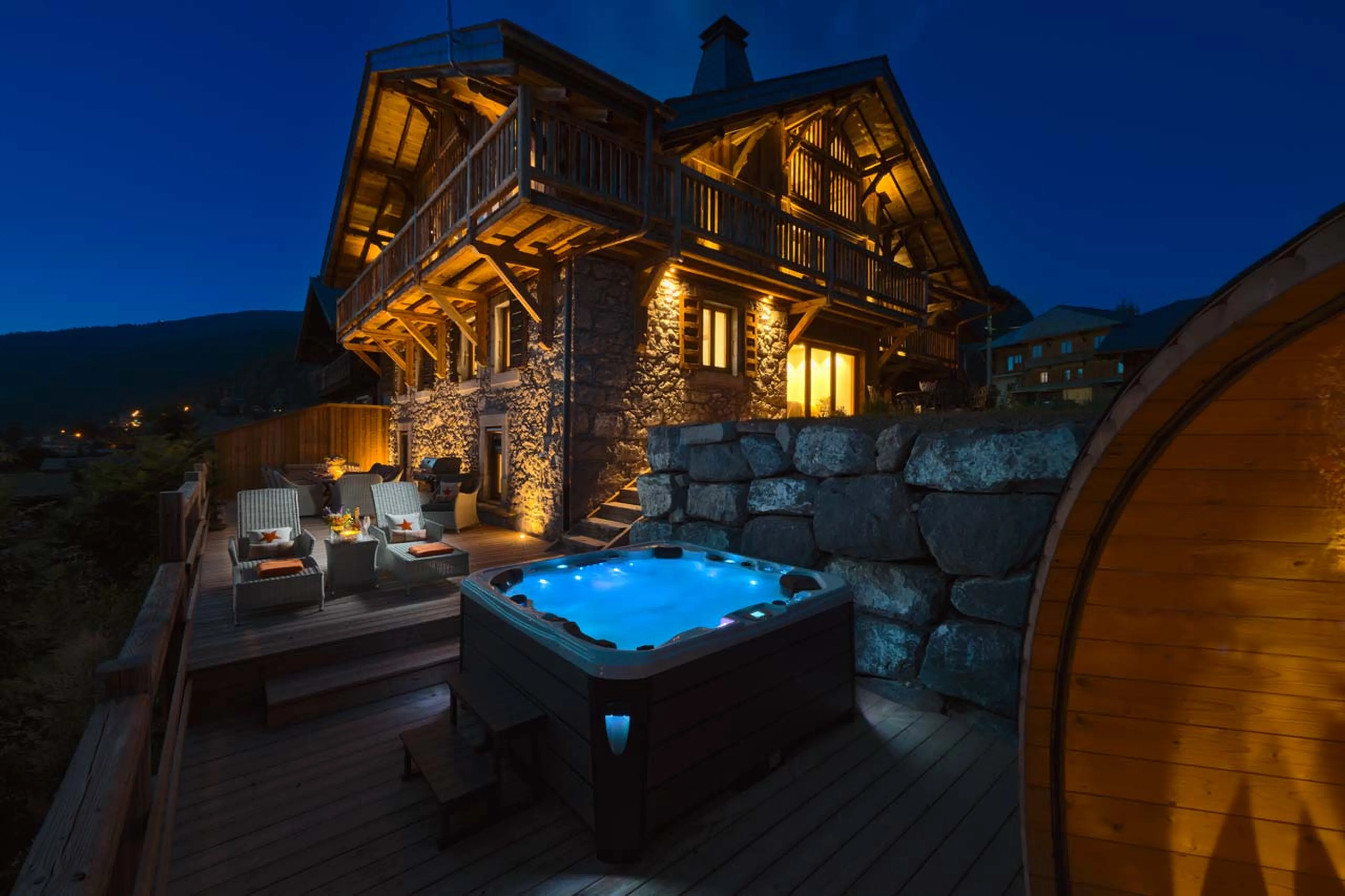 Outdoor hot tub on terrace of The Old Macaroni in Morzine