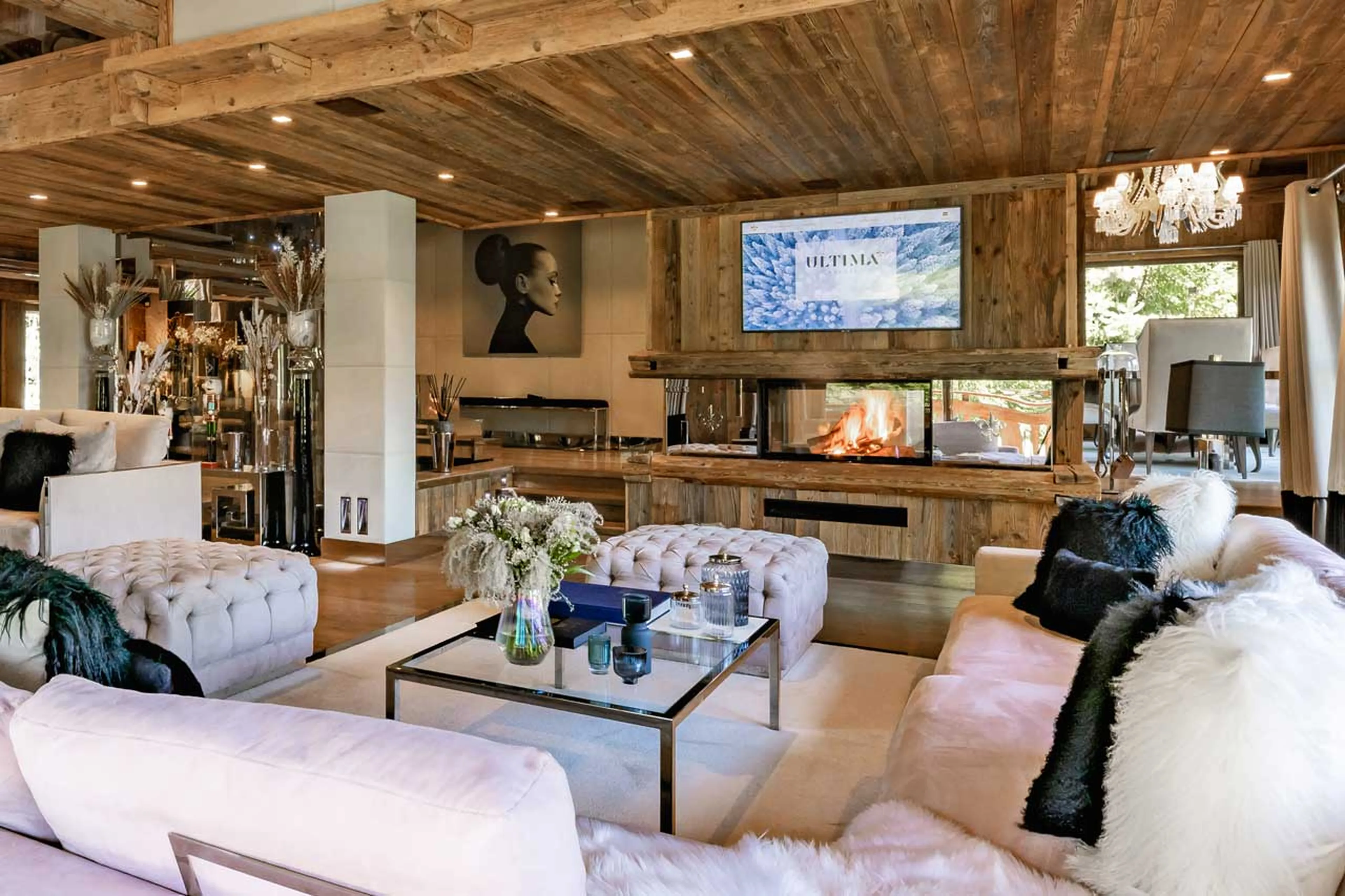 Living area with fireplace at Ultima Megeve
