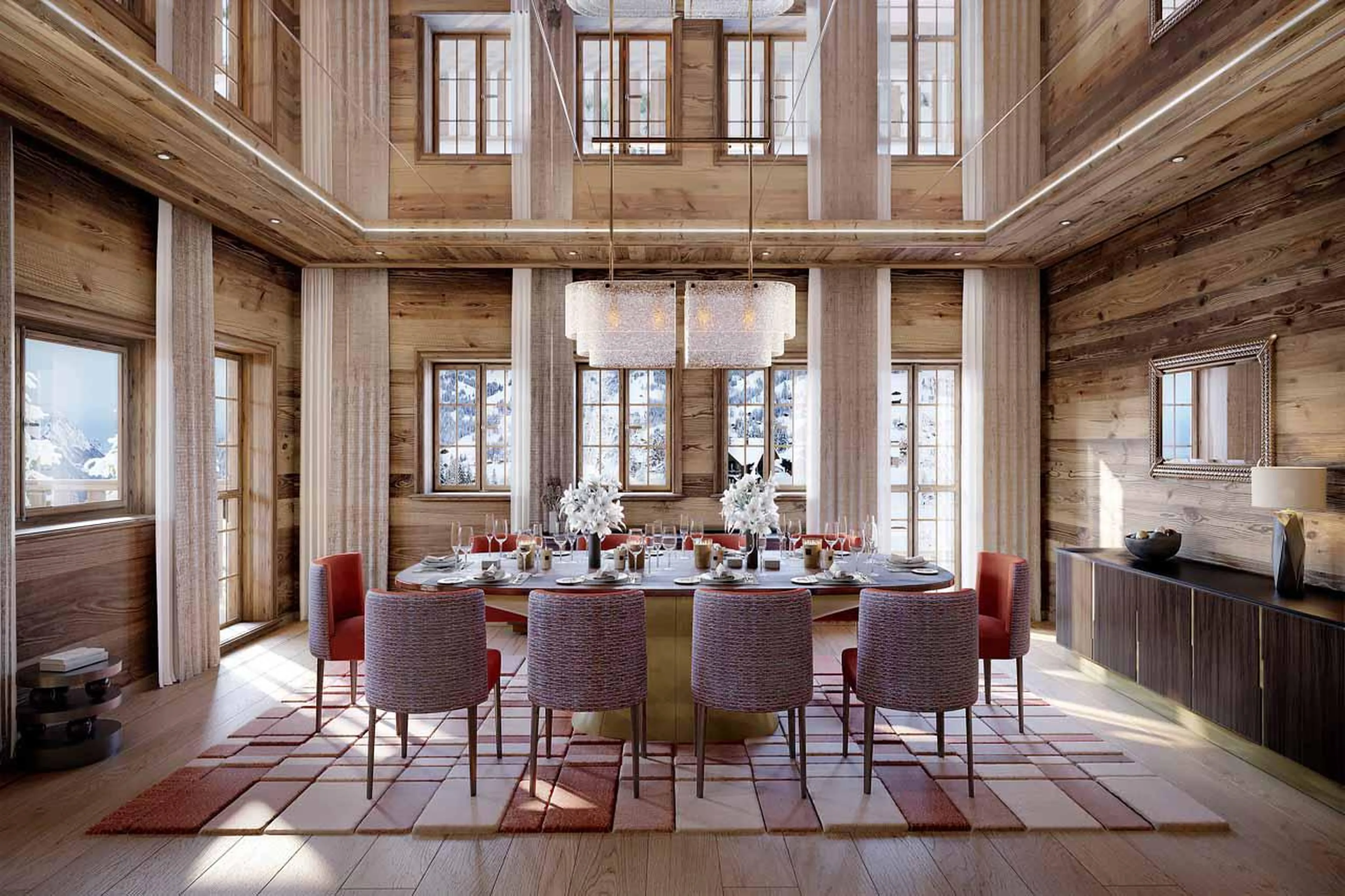 Elegant dining room with two-storey windows in Ultima Gstaad Promenade, Gstaad