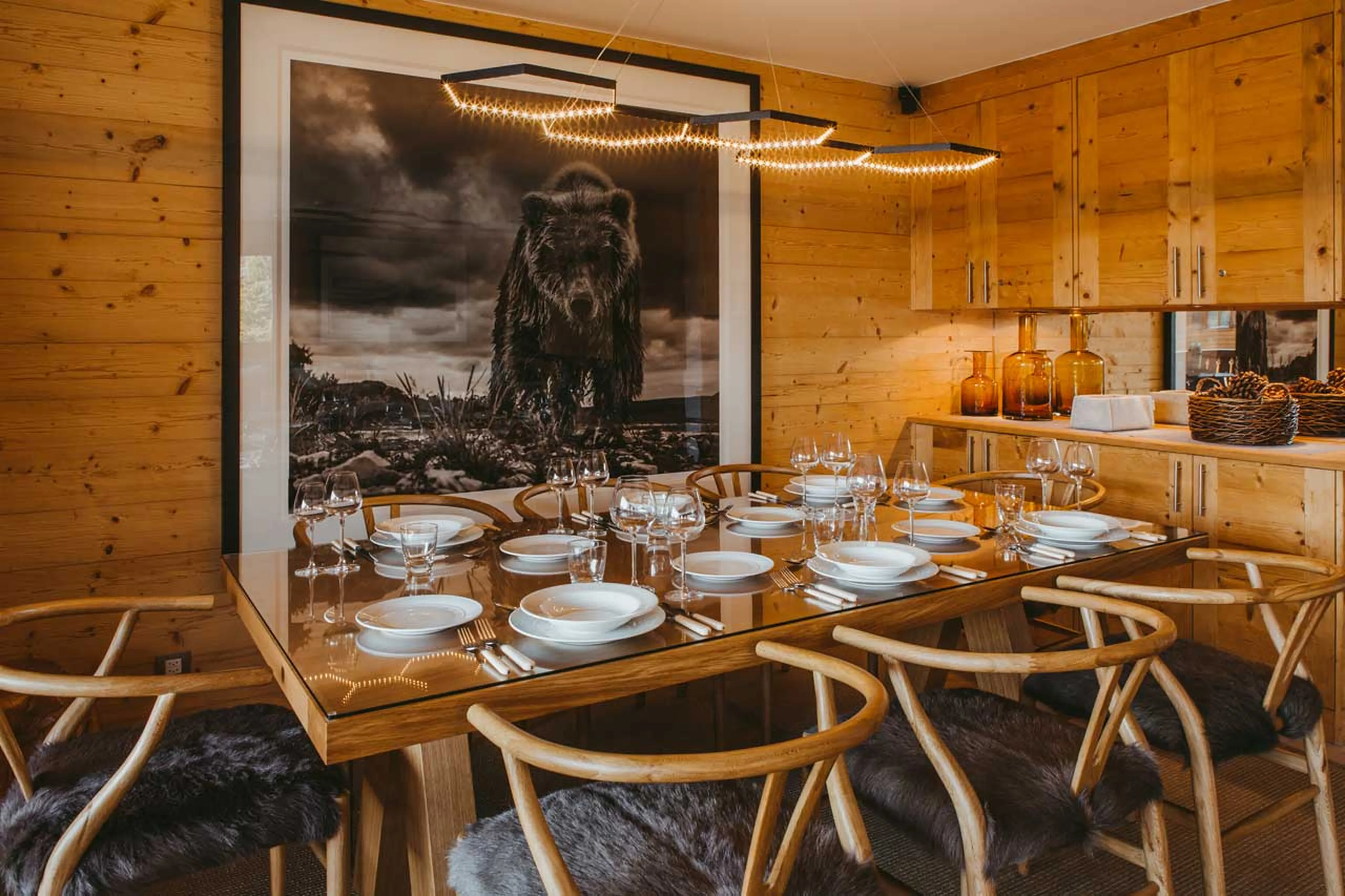 Dining table and living area at Valentine 211 in Verbier