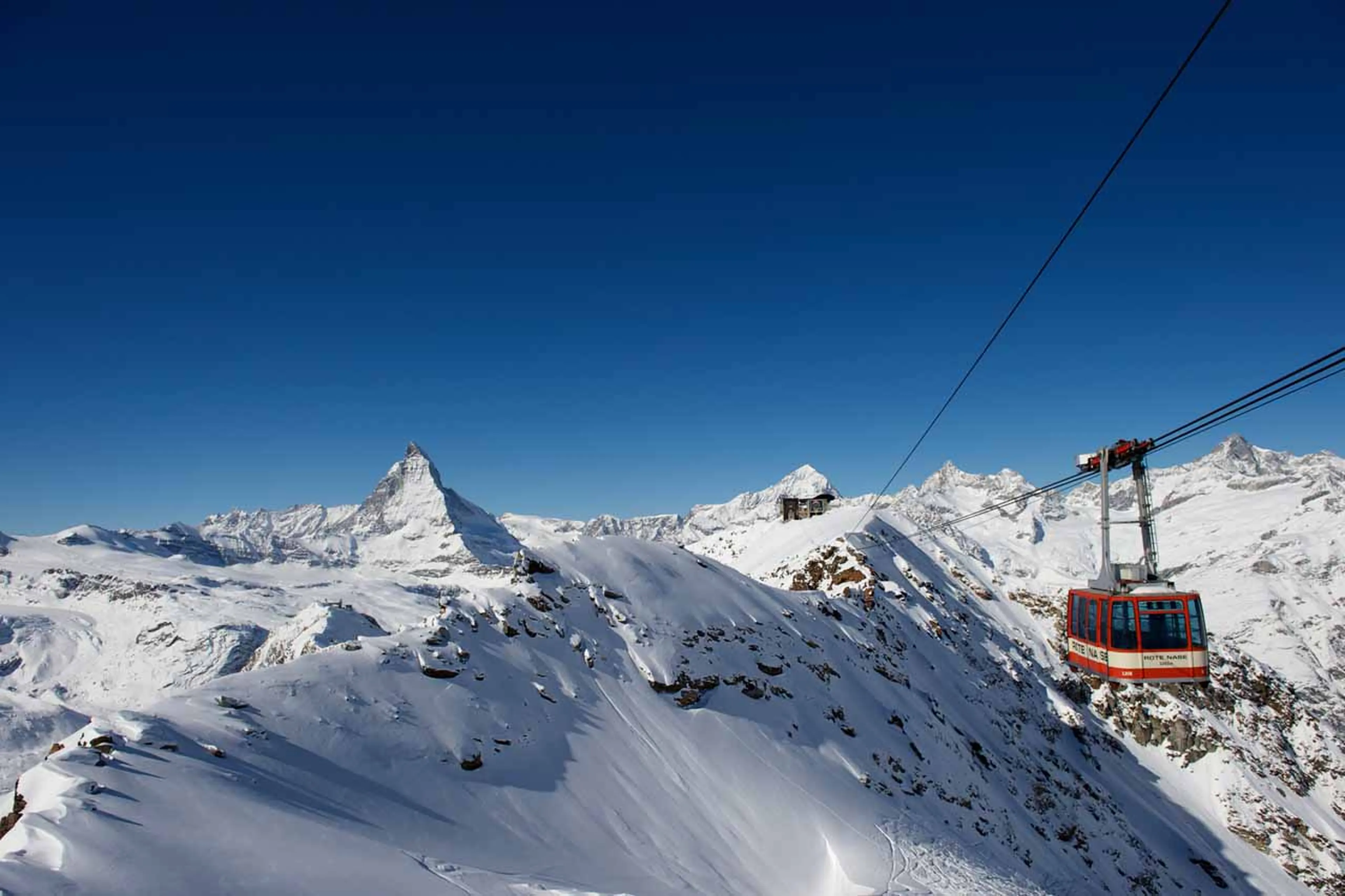 Zermatt ski resort with view of cable car and Matterhorn