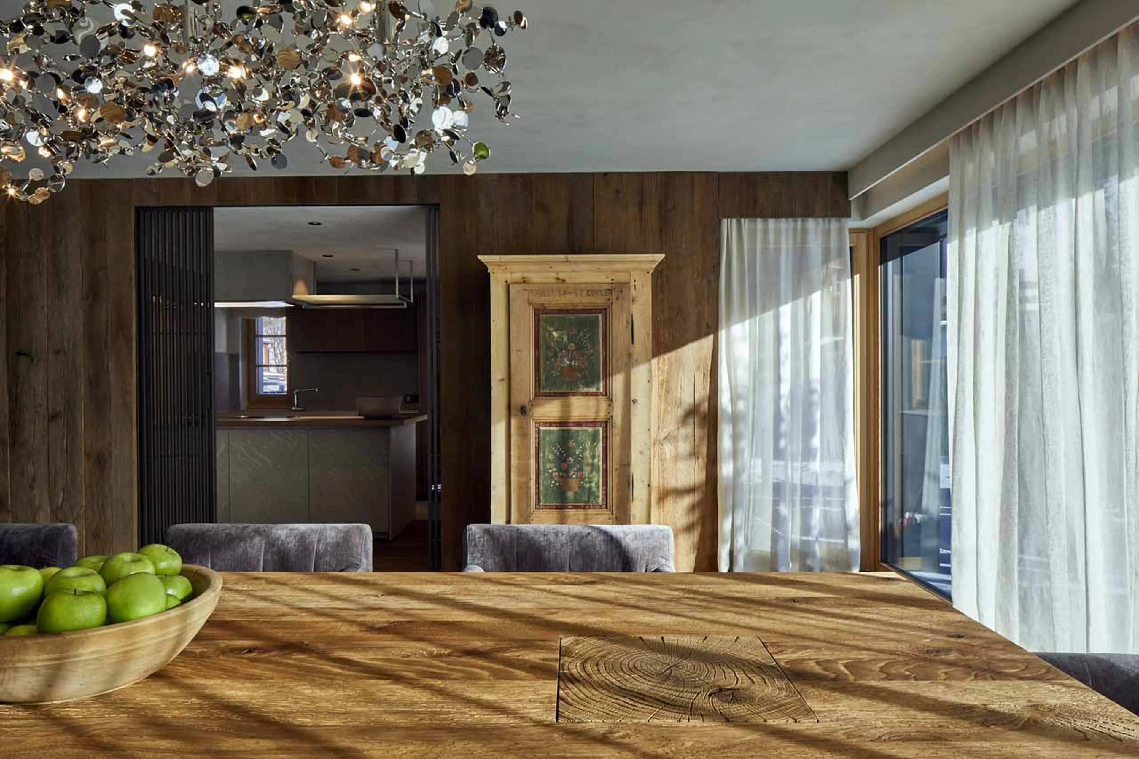 Dining area and kitchen at Villa al Sole 204 in Alta Badia