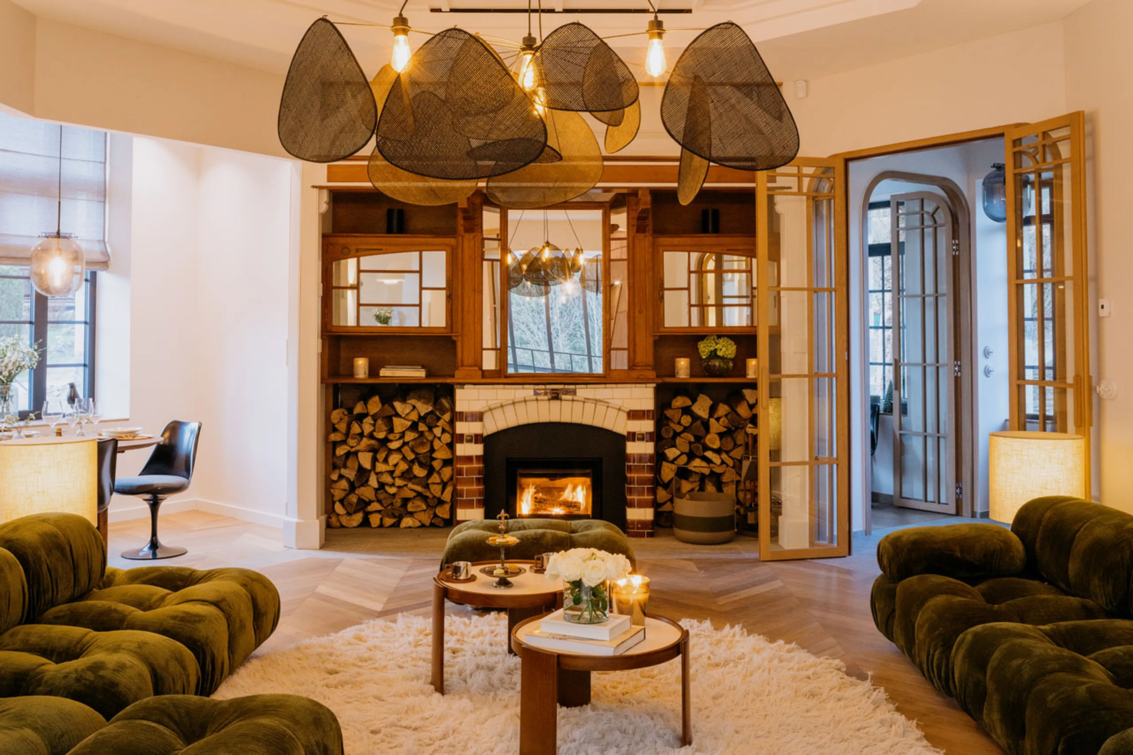Living room with fireplace at Villa Butterfly in Chamonix
