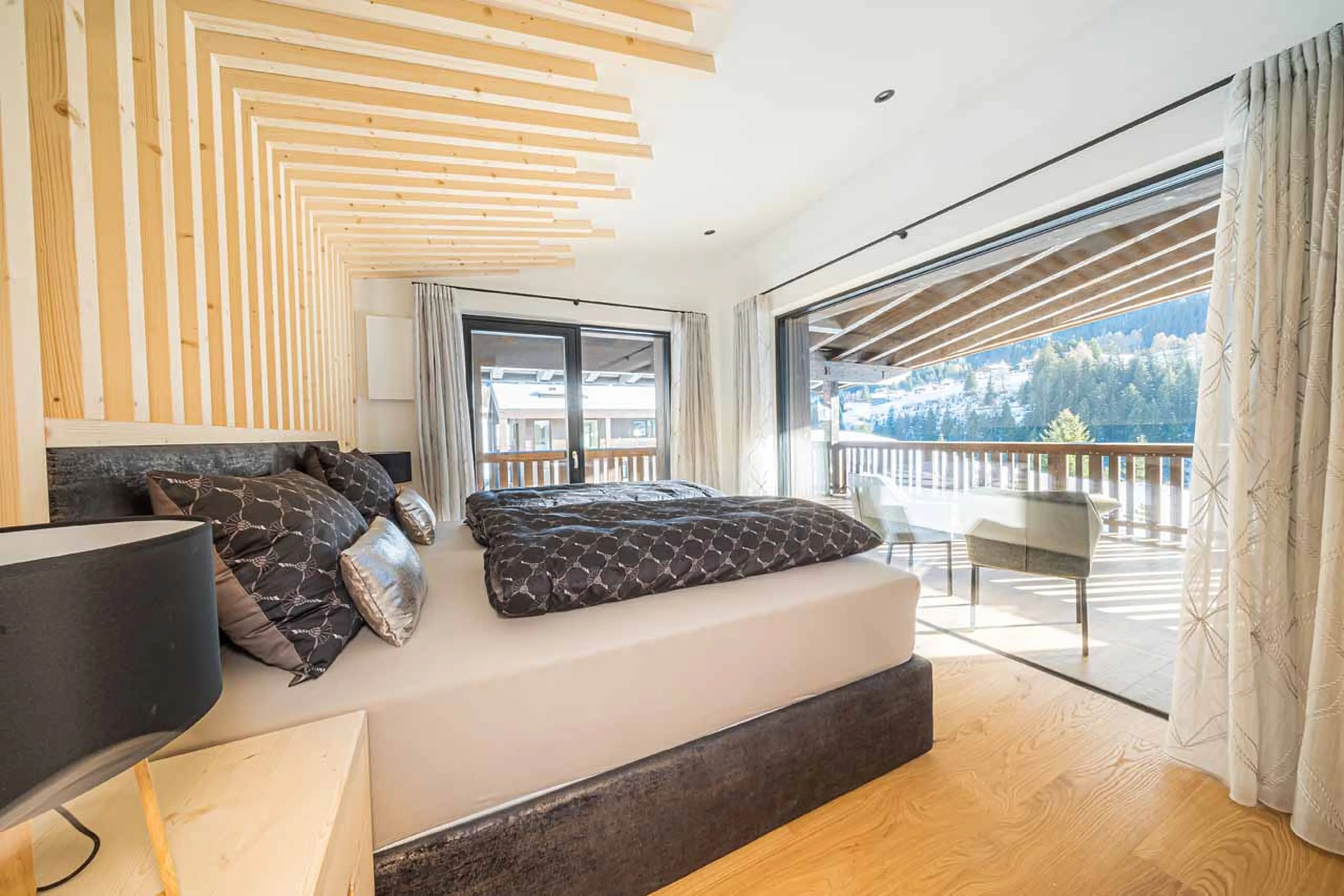 Bedroom one at Chalet Carolina in Val Gardena