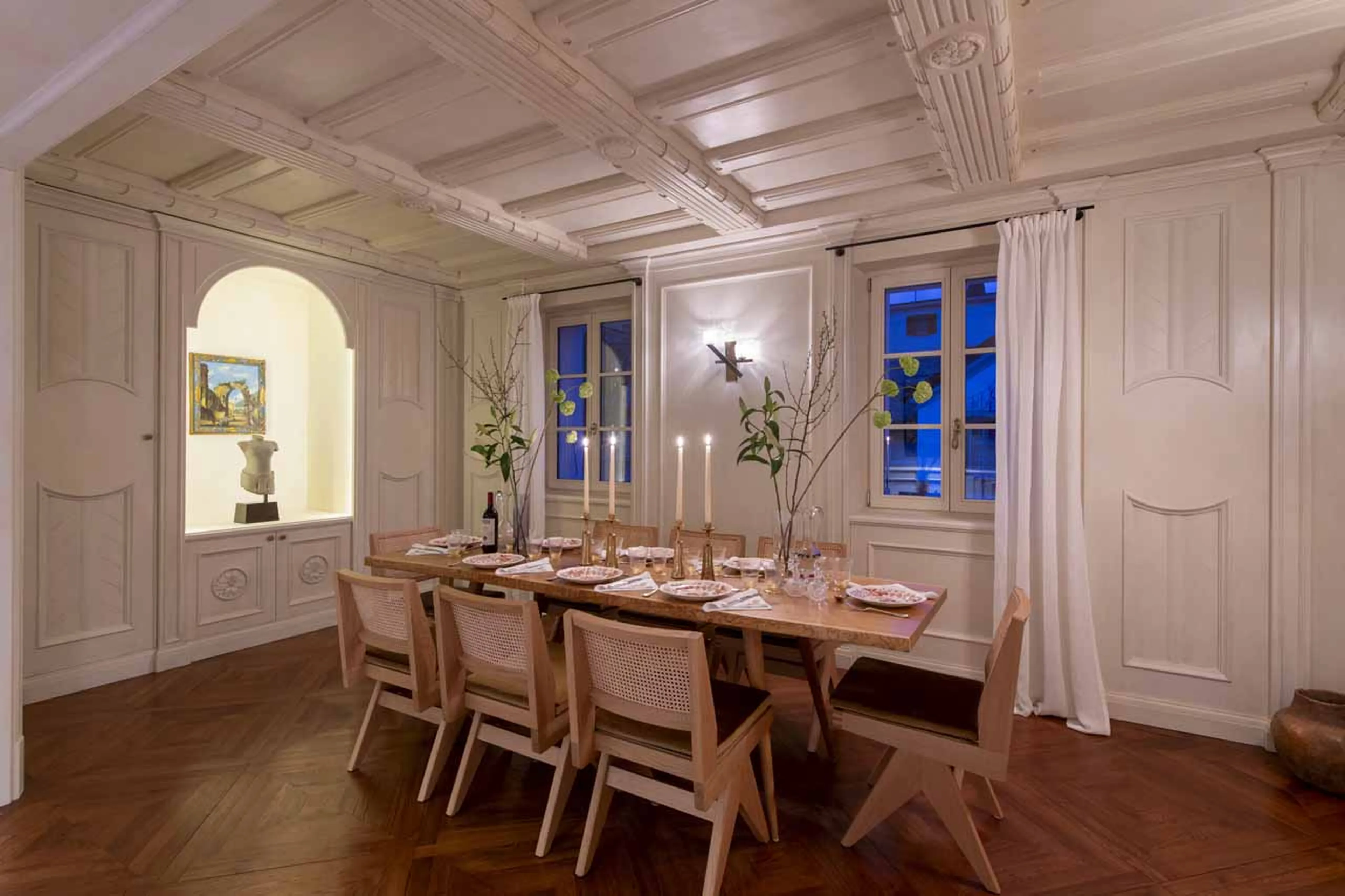 Dining room at night in Villa Erica 1, St Moritz