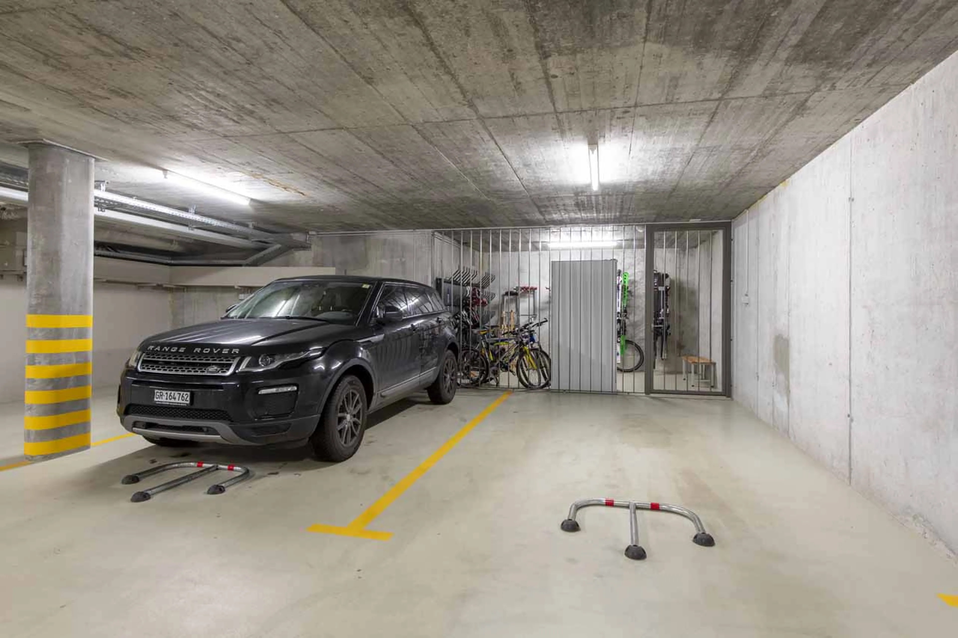 Garage with parking spaces in Villa Erica 2, St Moritz