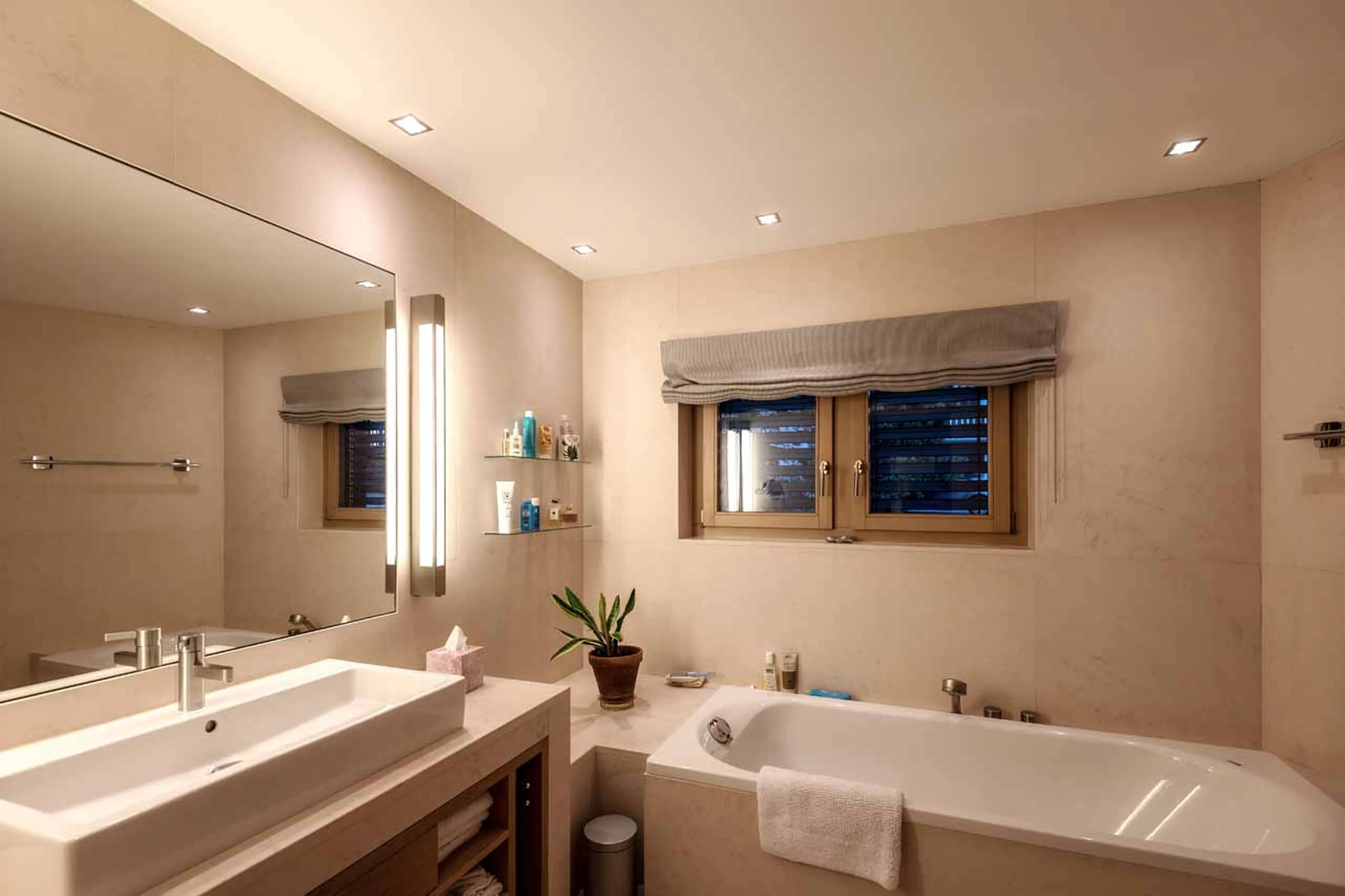 Bathtub in bathroom at Villa Grialetsch in Klosters