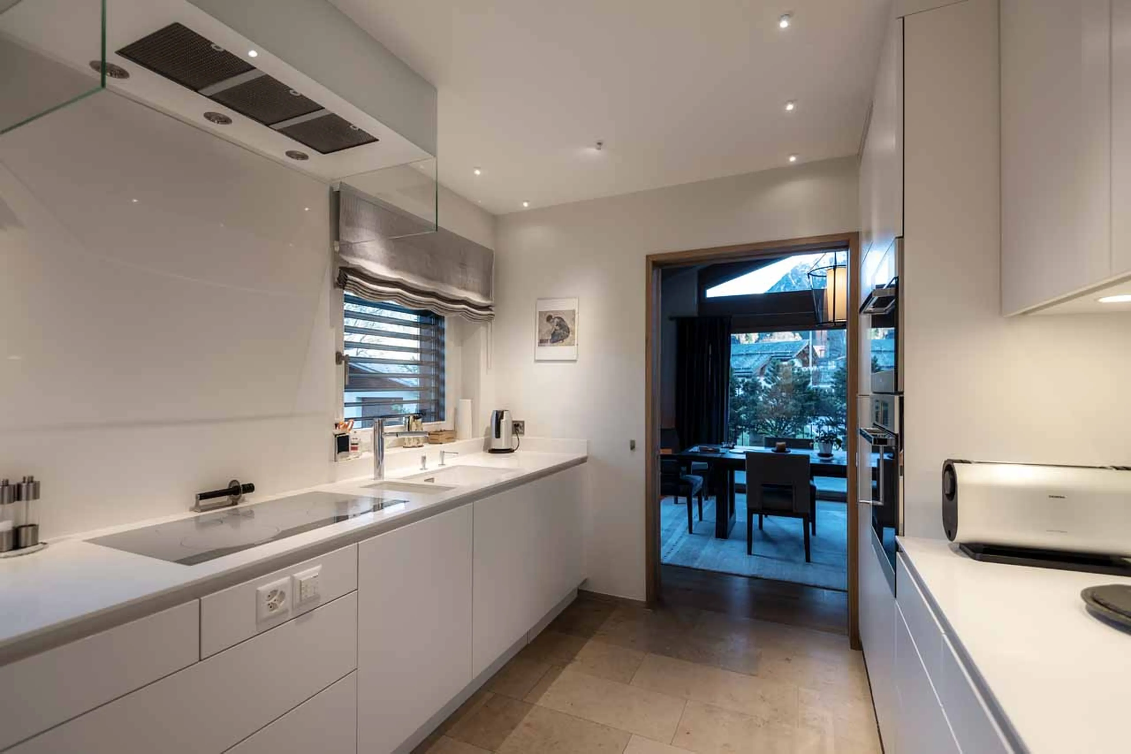 Kitchen & dining area at Villa Grialetsch in Klosters
