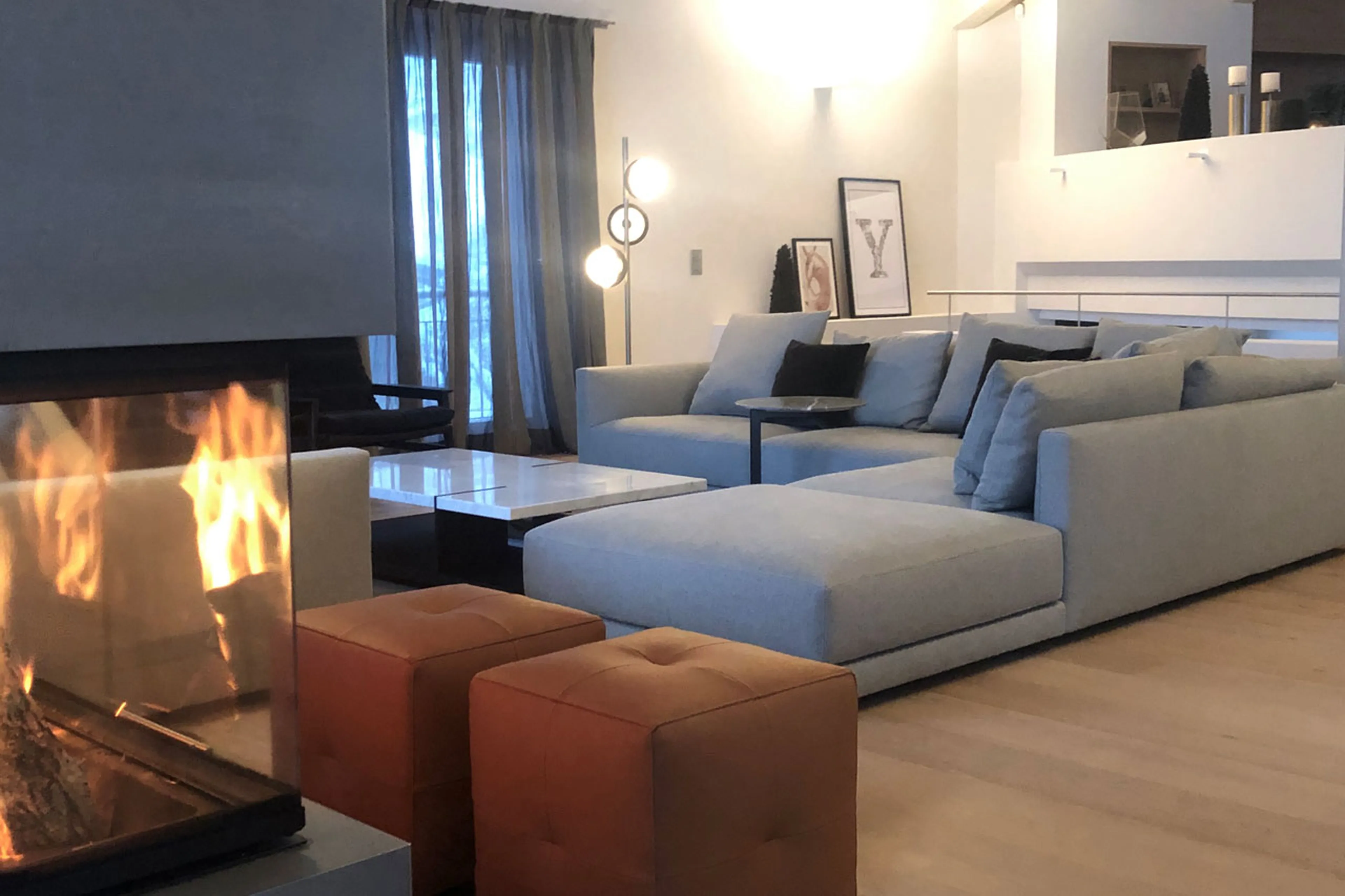 Fireplace in living area at Villa Grialetsch in Klosters