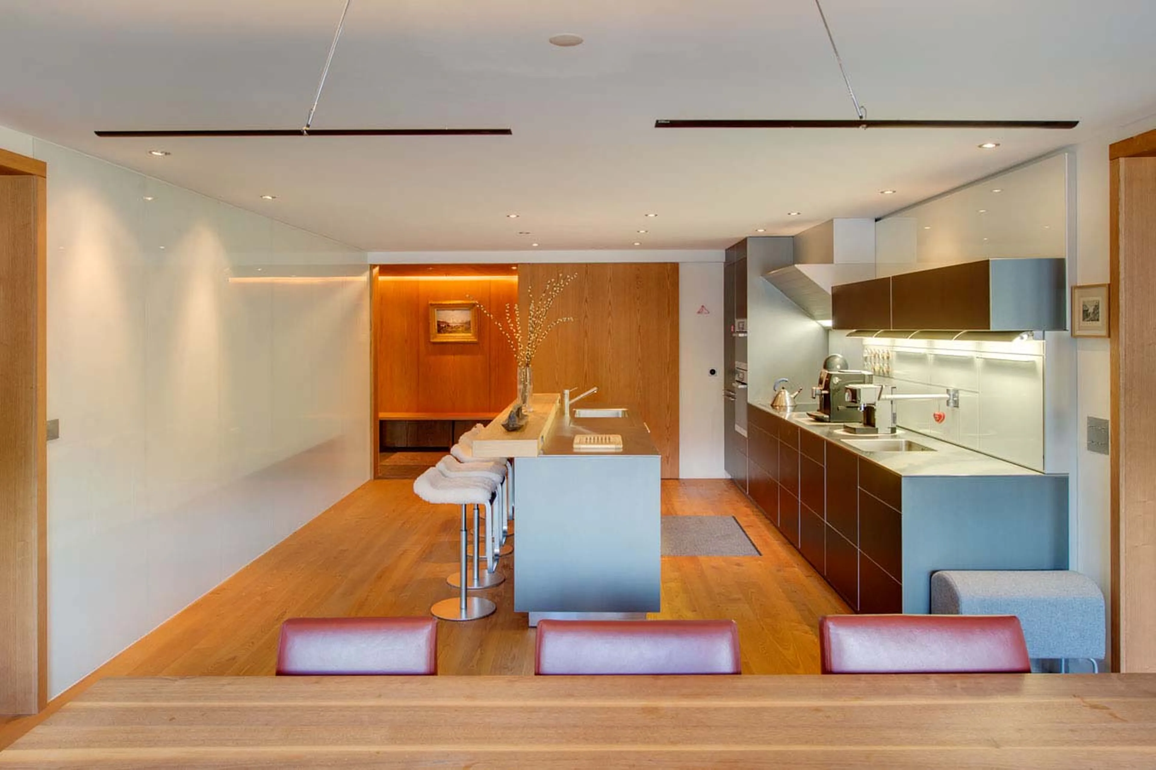 Dining area and kitchen at Whymper Residence in Zermatt