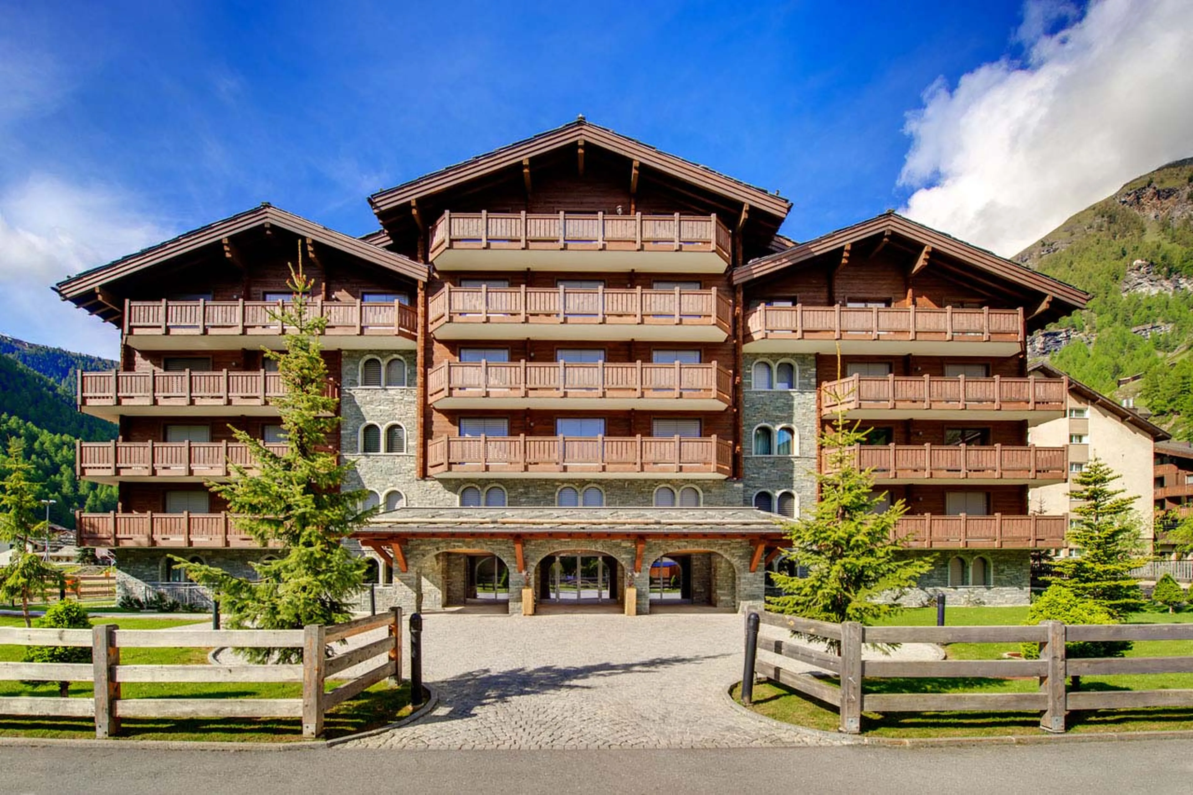 Exterior of Whymper Residence in Zermatt in summer