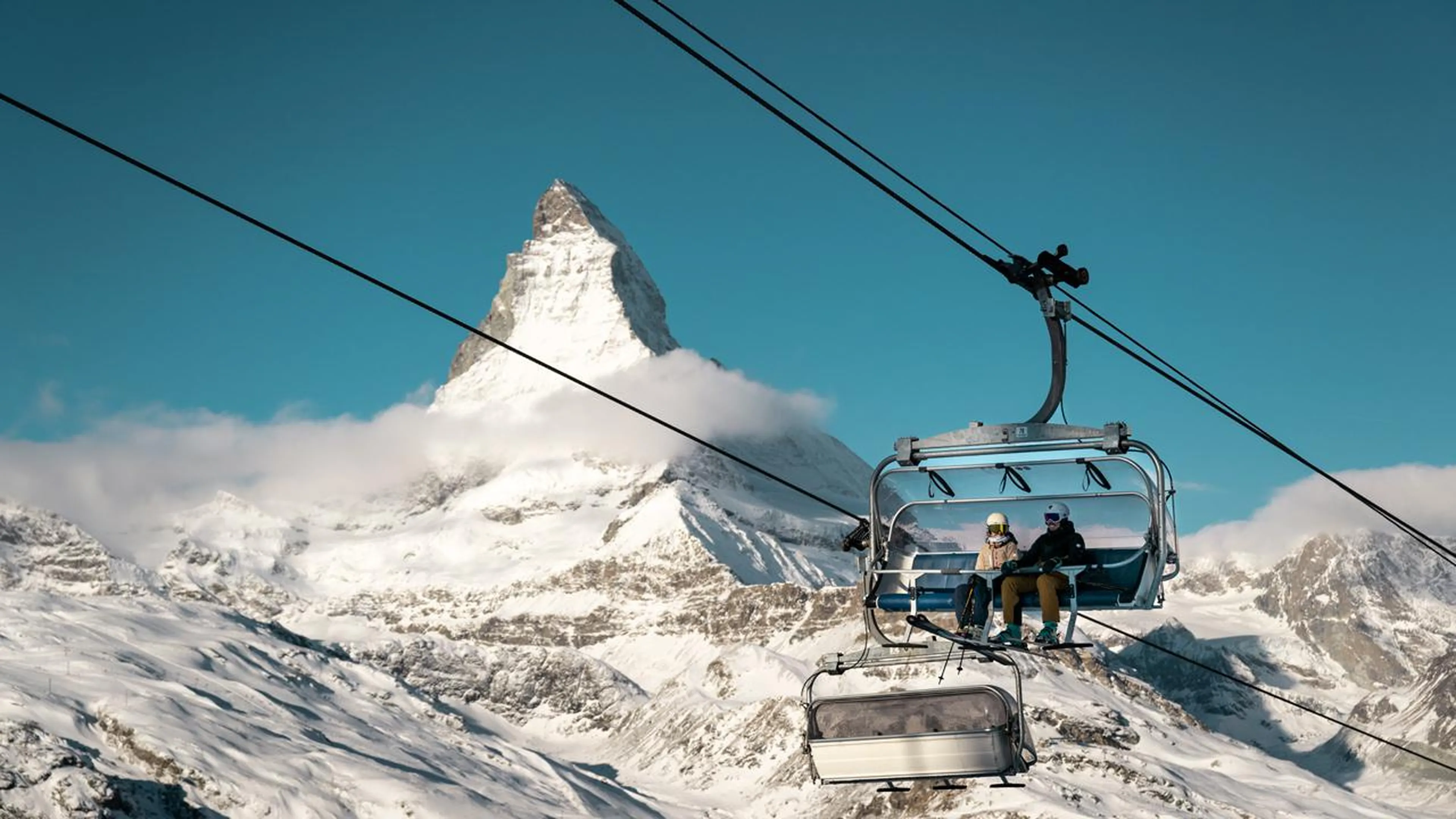 Chairlift in Zermatt with Matterhorn backdrop