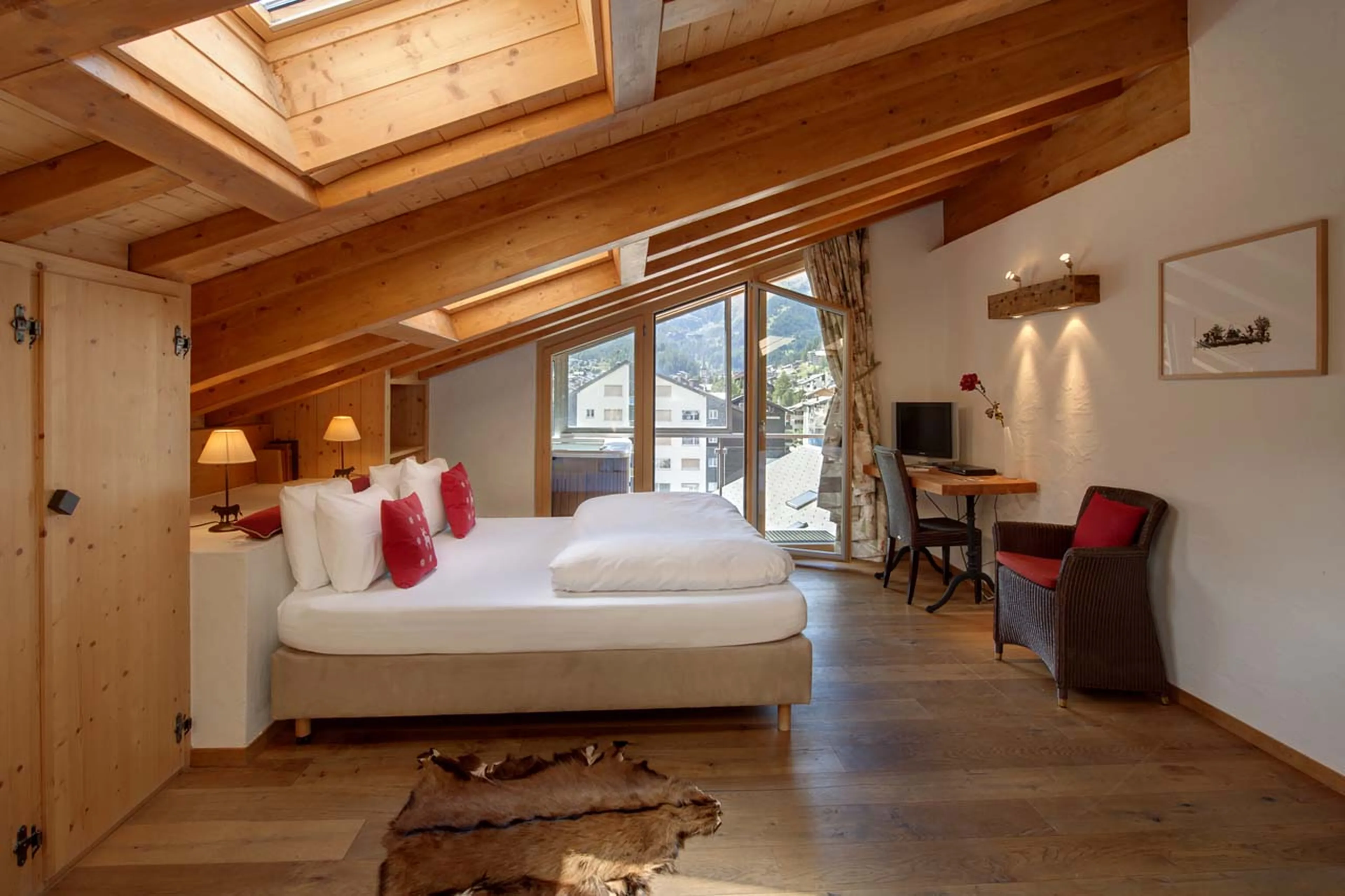 Access to balcony from bedroom one at Zermatt Lodge in Zermatt